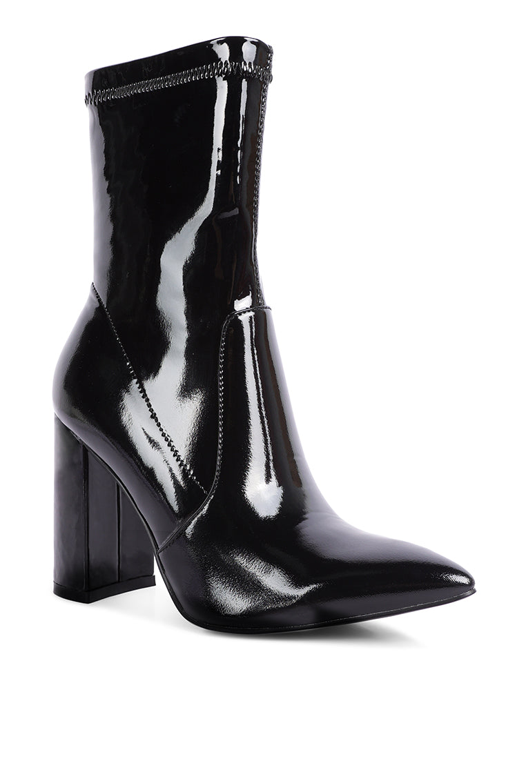 Pluto Block Heel Stiletto Ankle Boot featuring a sleek design with a side zipper and block heel, perfect for stylish women.