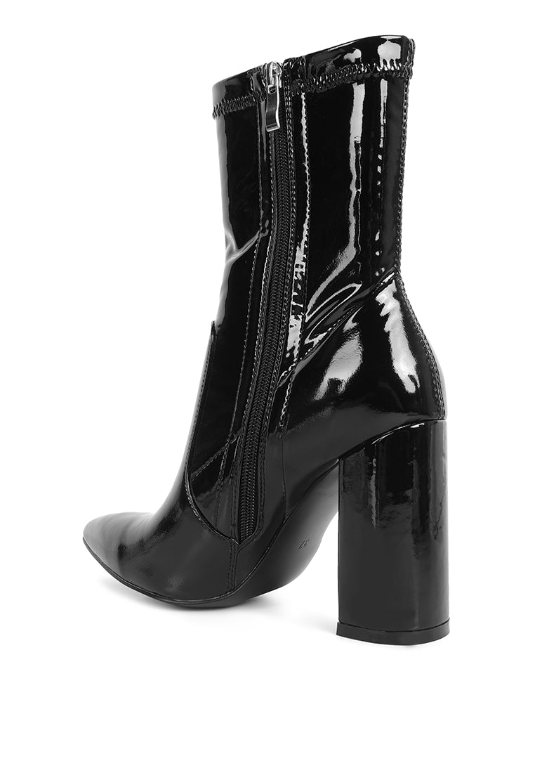 Pluto Block Heel Stiletto Ankle Boot featuring a sleek design with a side zipper and block heel, perfect for stylish women.