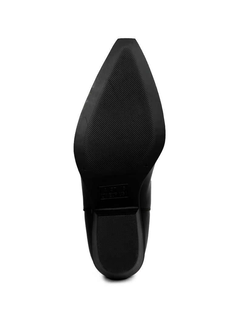 Ponsies Boot featuring intricate embroidery, soft cushion insole, and stylish short block heels in a faux leather design.