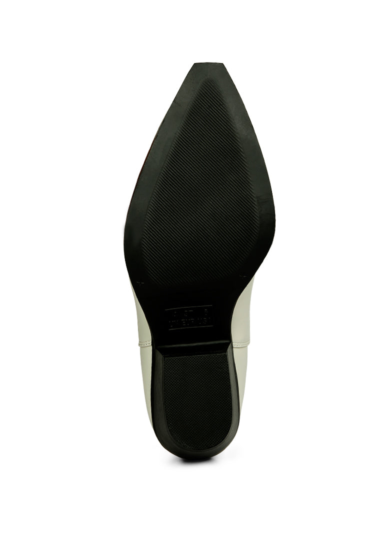 Ponsies Boot featuring intricate embroidery, soft cushion insole, and stylish short block heels in a faux leather design.