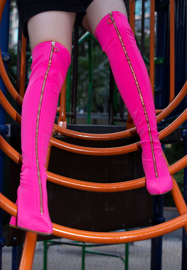 Ronettes Over-The-Knee Boot featuring a block heel, metallic zipper, and elasticated gussets for a stylish and comfortable fit.