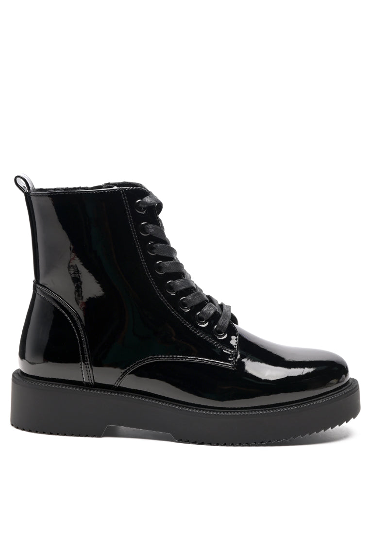 Rubble Statement PU Lace Up Ankle Boots featuring a shiny patent finish, lace-up details, and a side zip opening for easy wear.