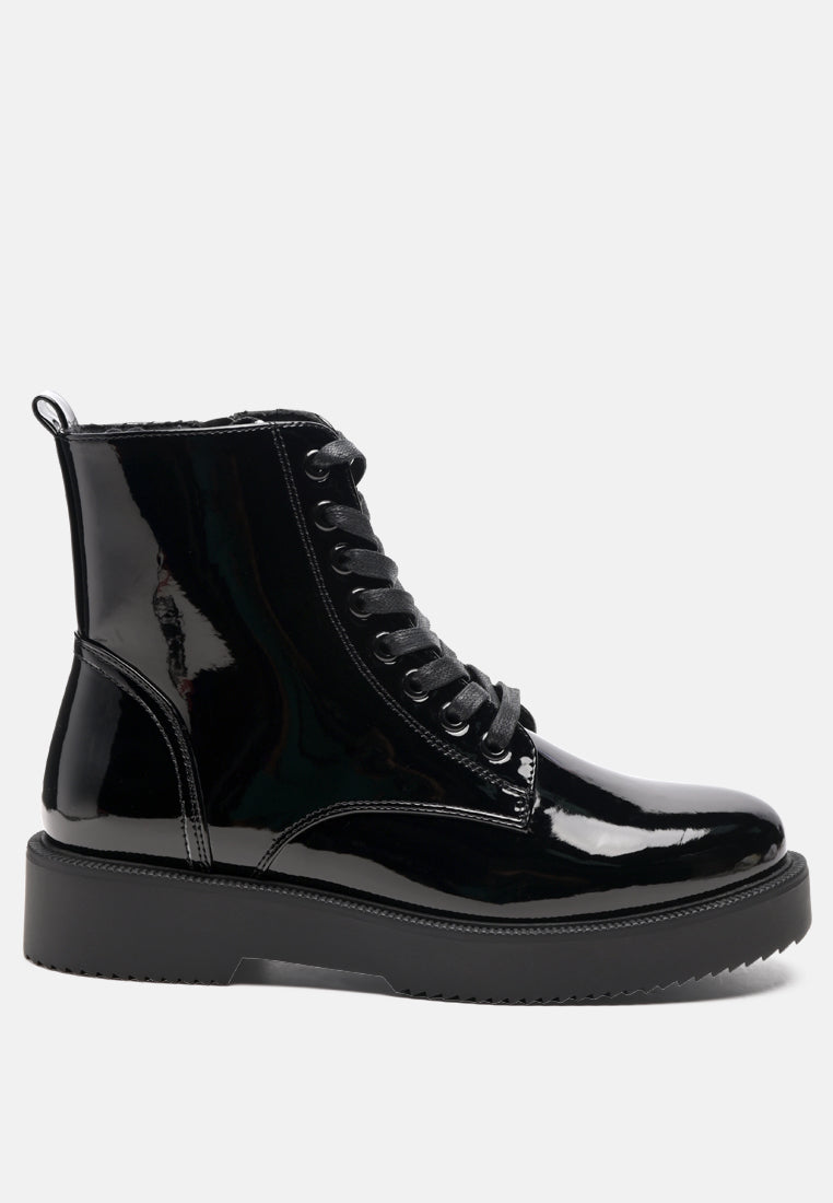 Rubble Statement PU Lace Up Ankle Boots featuring a shiny patent finish, lace-up details, and a side zip opening for easy wear.