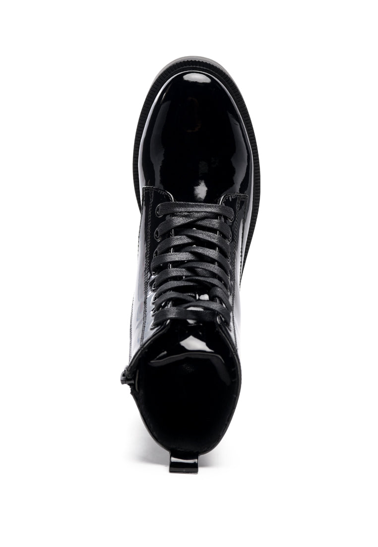 Rubble Statement PU Lace Up Ankle Boots featuring a shiny patent finish, lace-up details, and a side zip opening for easy wear.