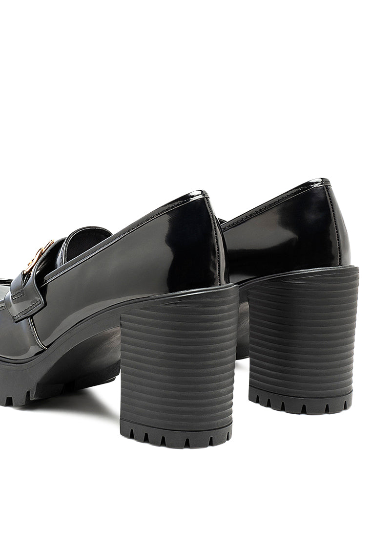 Sachs Block Heeled Chunky Loafers in patent faux leather with metal chain detail, showcasing a stylish and elegant design.