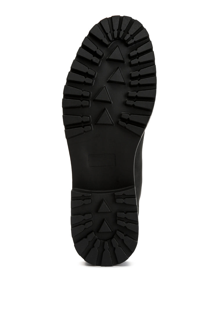 Shirly Quilt Collared Ankle Boots in beige with dark brown rim and metallic eyelets, showcasing a stylish design.