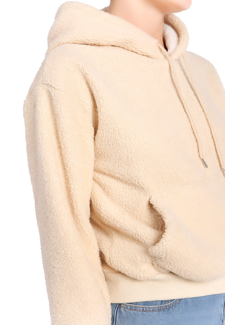A cozy soft fleece pullover drawstring hoodie in a stylish design, featuring a kangaroo pocket and faux fur lining.