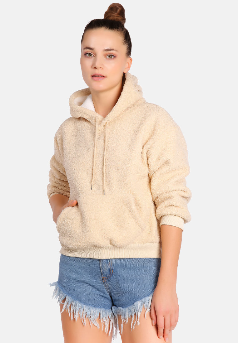 A cozy soft fleece pullover drawstring hoodie in a stylish design, featuring a kangaroo pocket and faux fur lining.