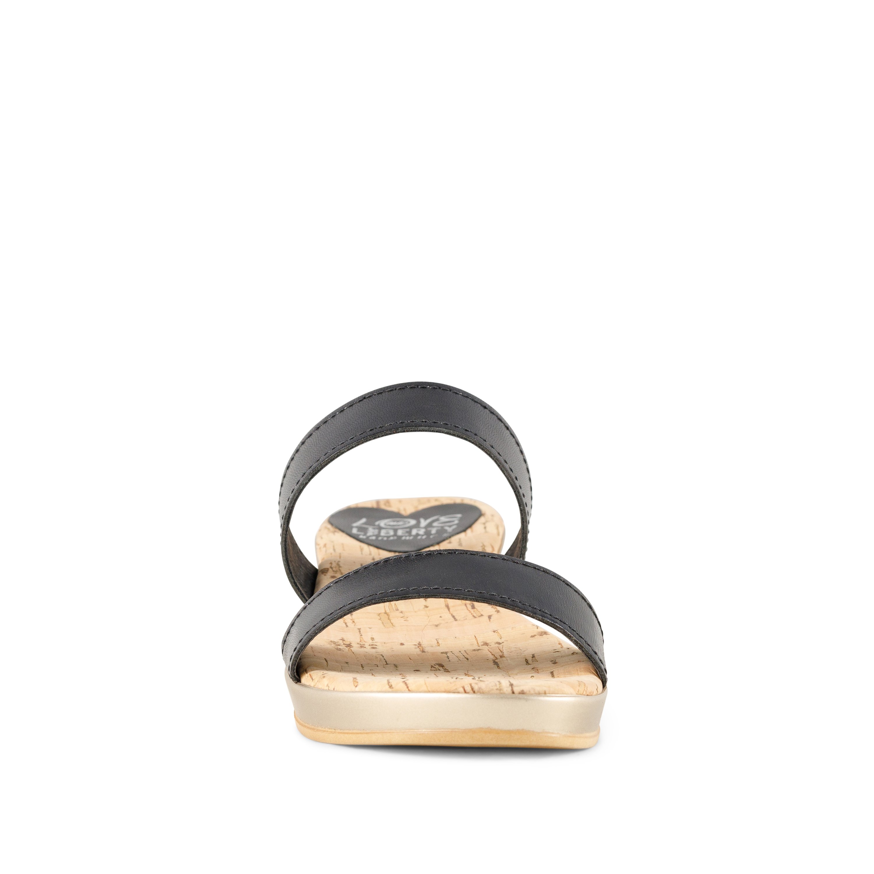 Sonoma sandals featuring a stylish leather upper, cork sock liner, and low wedge design, perfect for summer vacations.