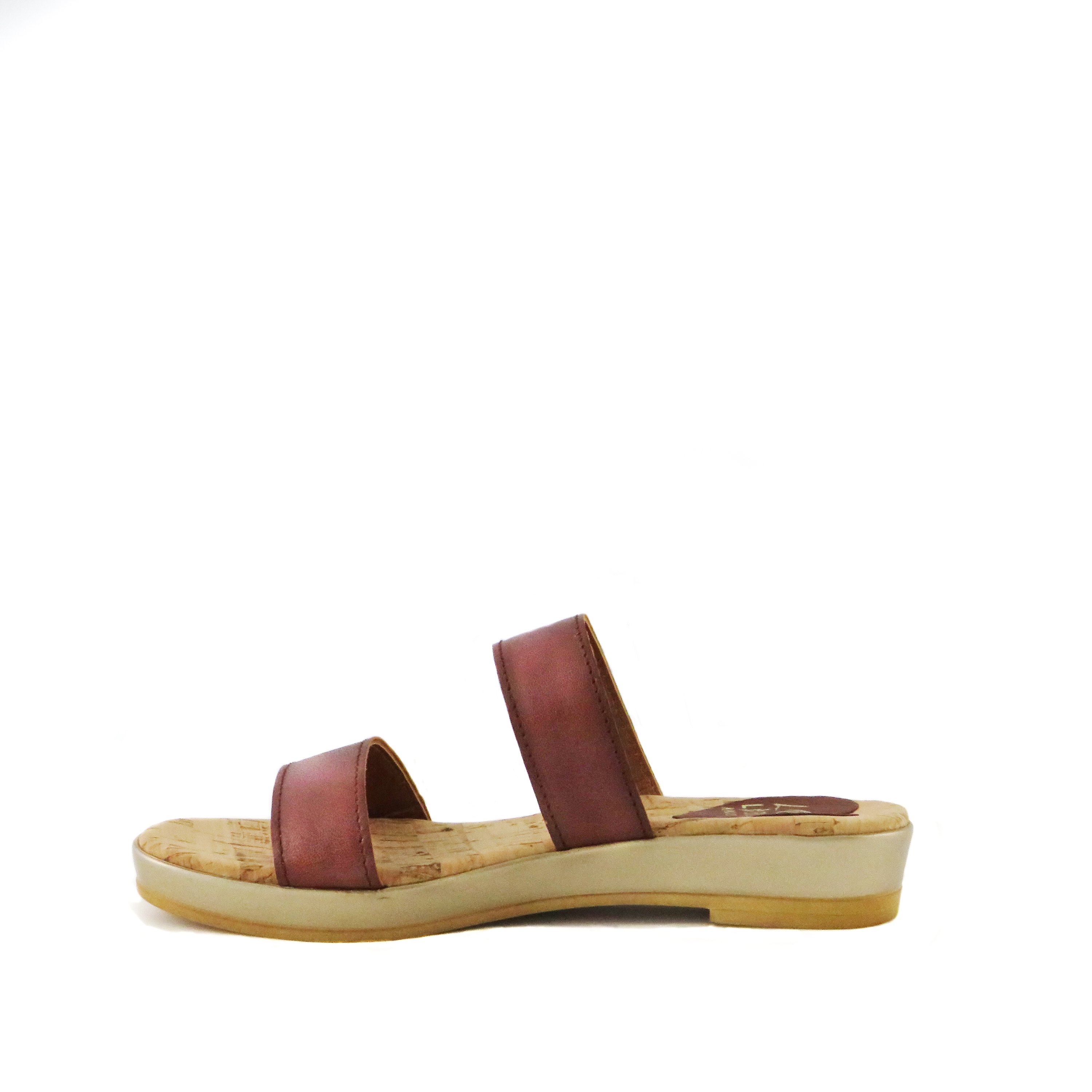 Sonoma sandals featuring a stylish leather upper, cork sock liner, and low wedge design, perfect for summer vacations.