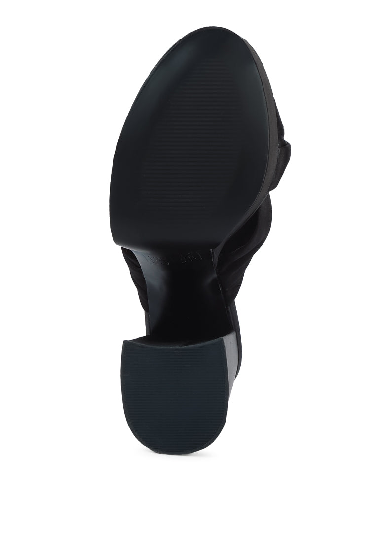 A pair of elegant Strobing Knotted Chunky Platform Heels featuring a satin knotted strap and chunky platform design, perfect for special occasions.