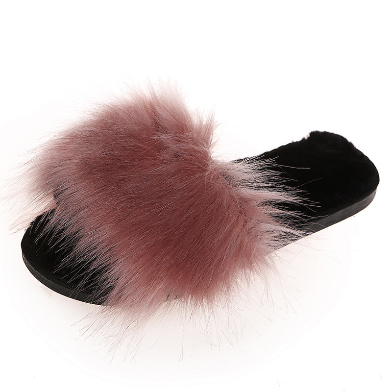 A pair of stylish plush slippers for plus size women, featuring a soft material and durable rubber sole, available in multiple colors.