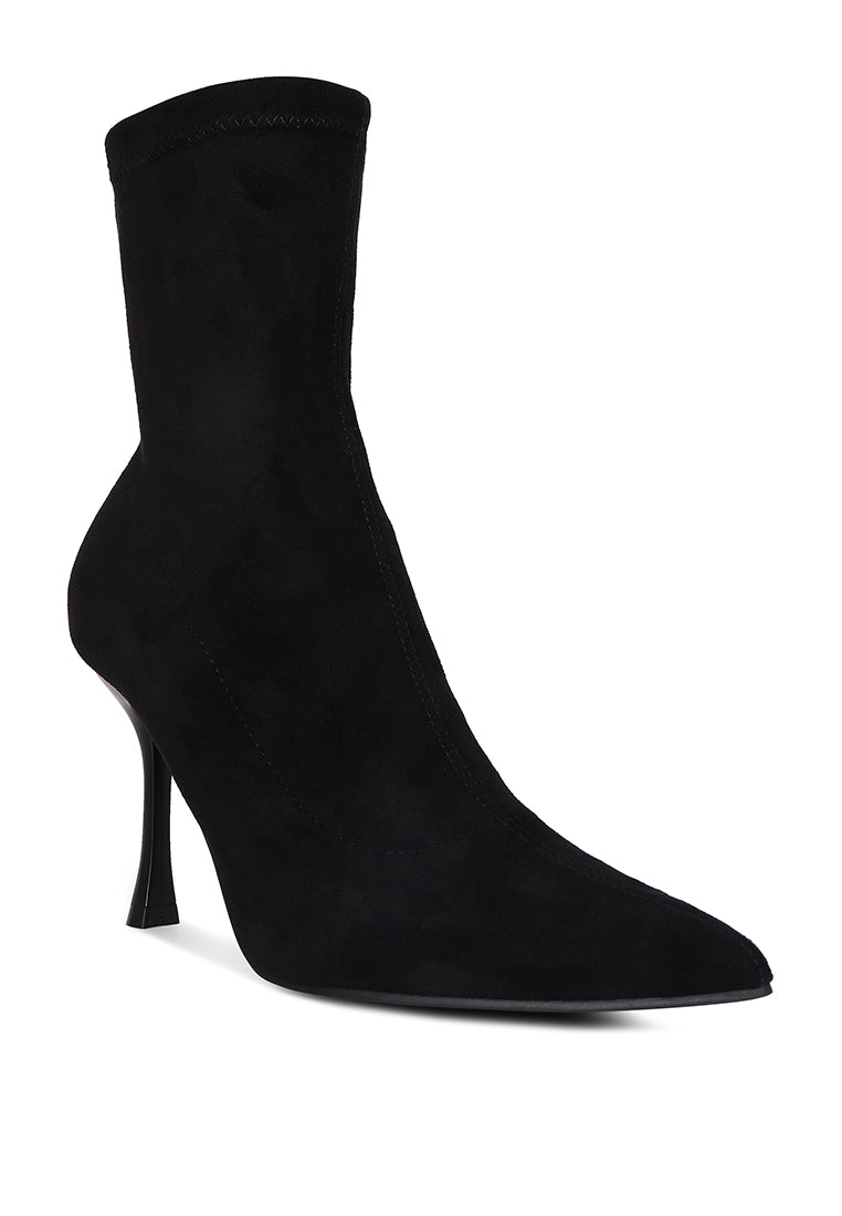 Tweeple Stiletto Boot with a pointed toe, featuring a sleek design, side zipper, and high heel, perfect for stylish women.