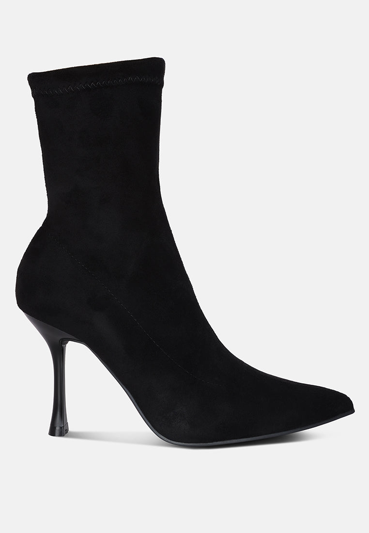 Tweeple Stiletto Boot with a pointed toe, featuring a sleek design, side zipper, and high heel, perfect for stylish women.