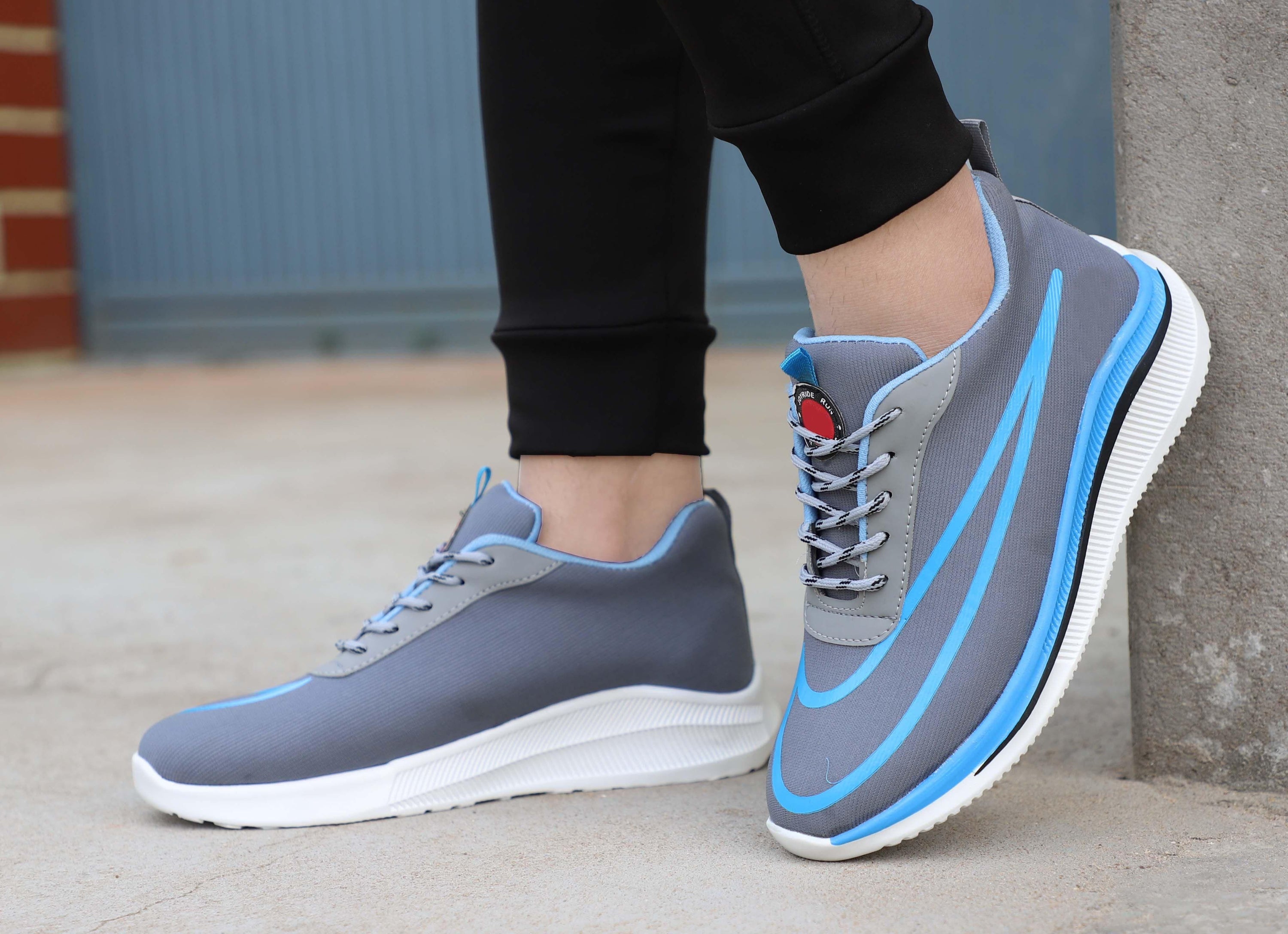 W18 Men Grey Casual Laceup Comfortable Sports Shoes featuring a grey mesh upper and Airmix sole, perfect for casual wear.