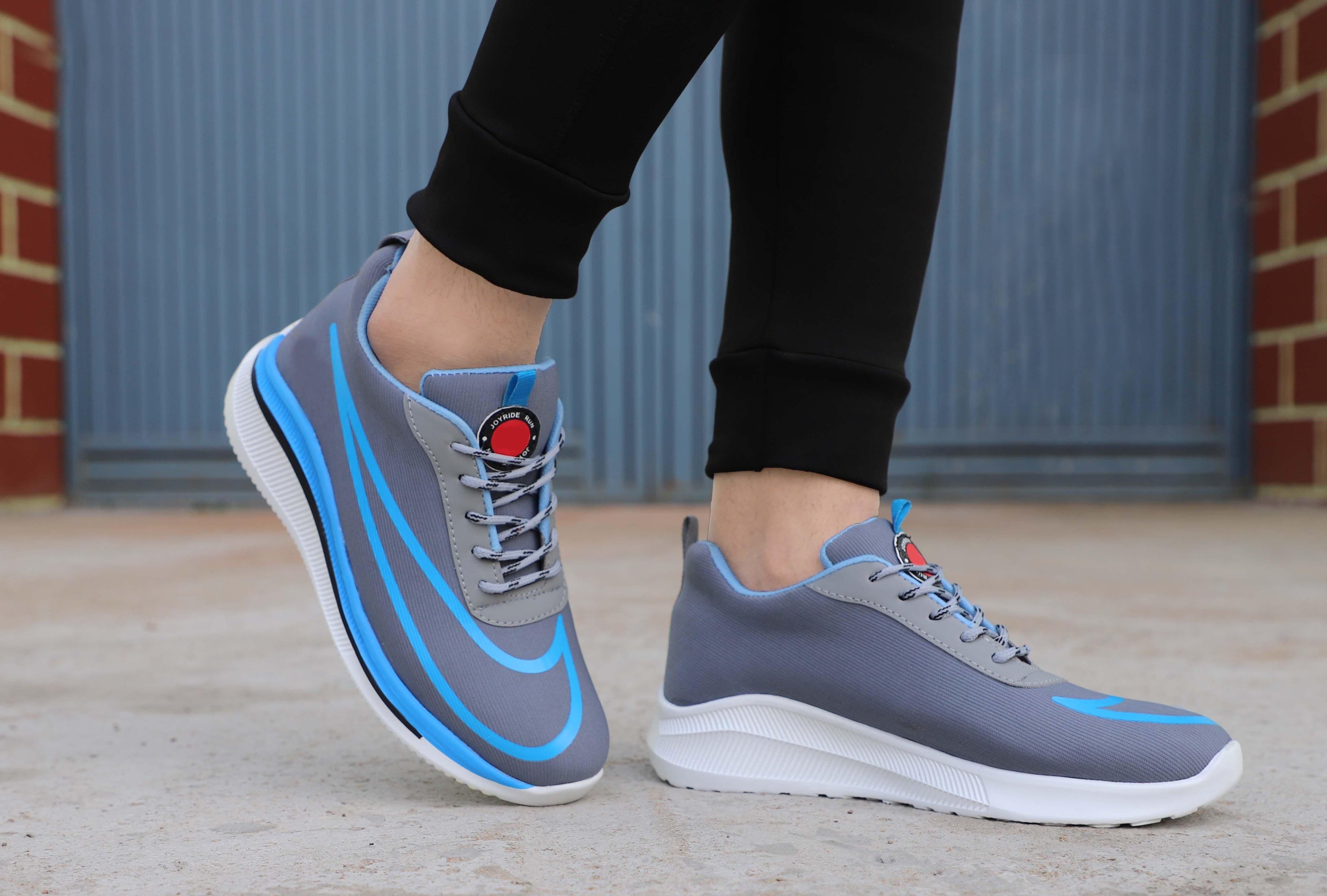 W18 Men Grey Casual Laceup Comfortable Sports Shoes featuring a grey mesh upper and Airmix sole, perfect for casual wear.