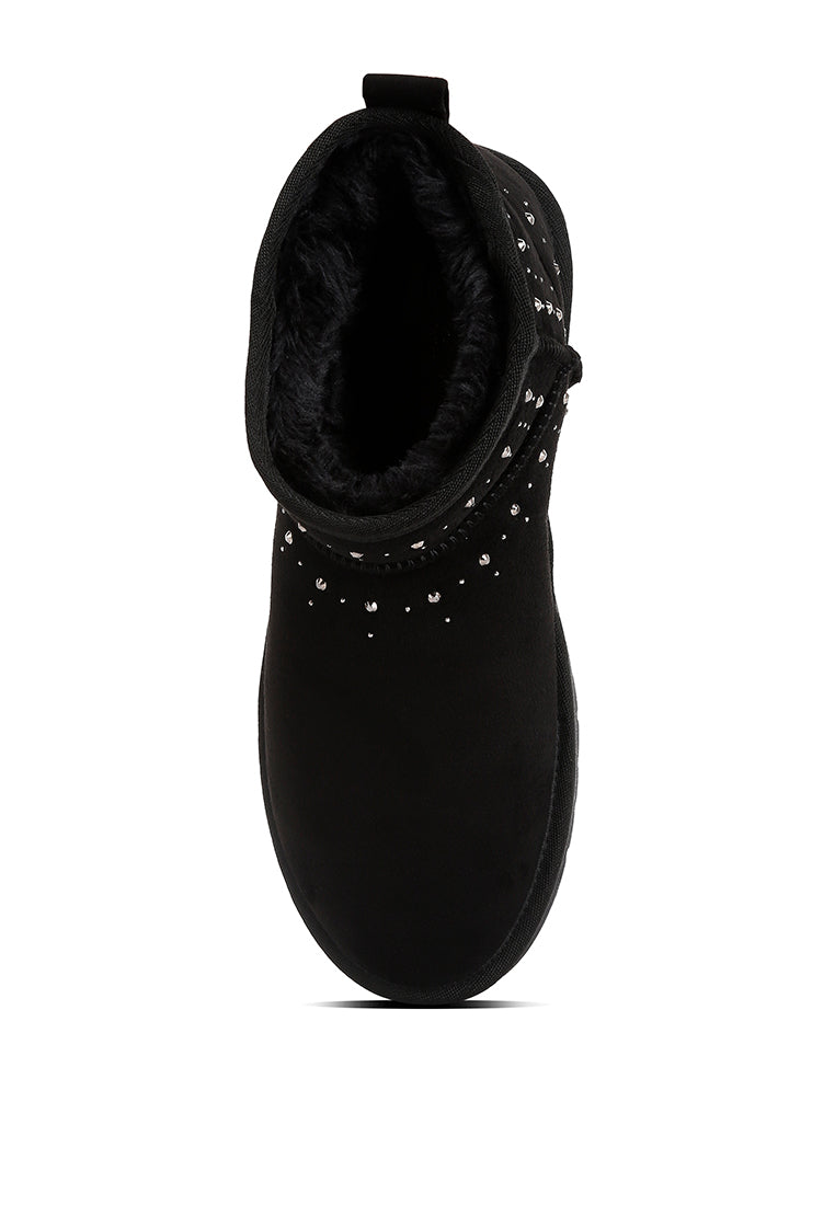 Winifred Rhinestone Embellished Fur Lined Boots featuring a suede exterior, rhinestone details, and a cozy fur lining.