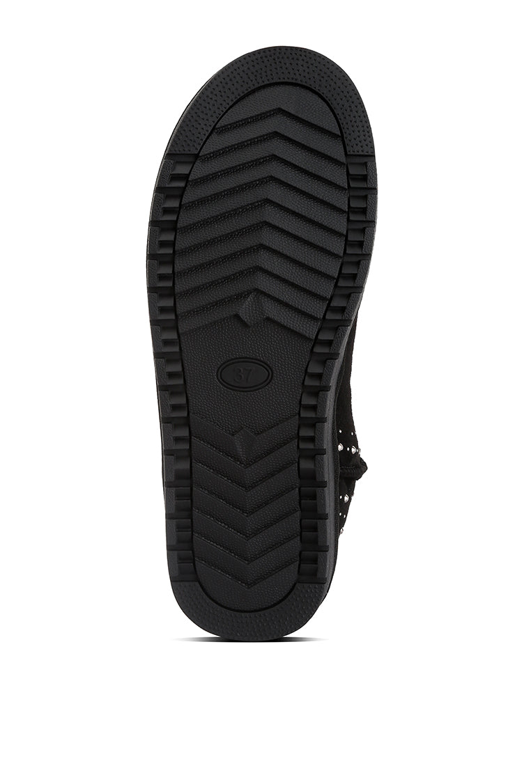 Winifred Rhinestone Embellished Fur Lined Boots featuring a suede exterior, rhinestone details, and a cozy fur lining.