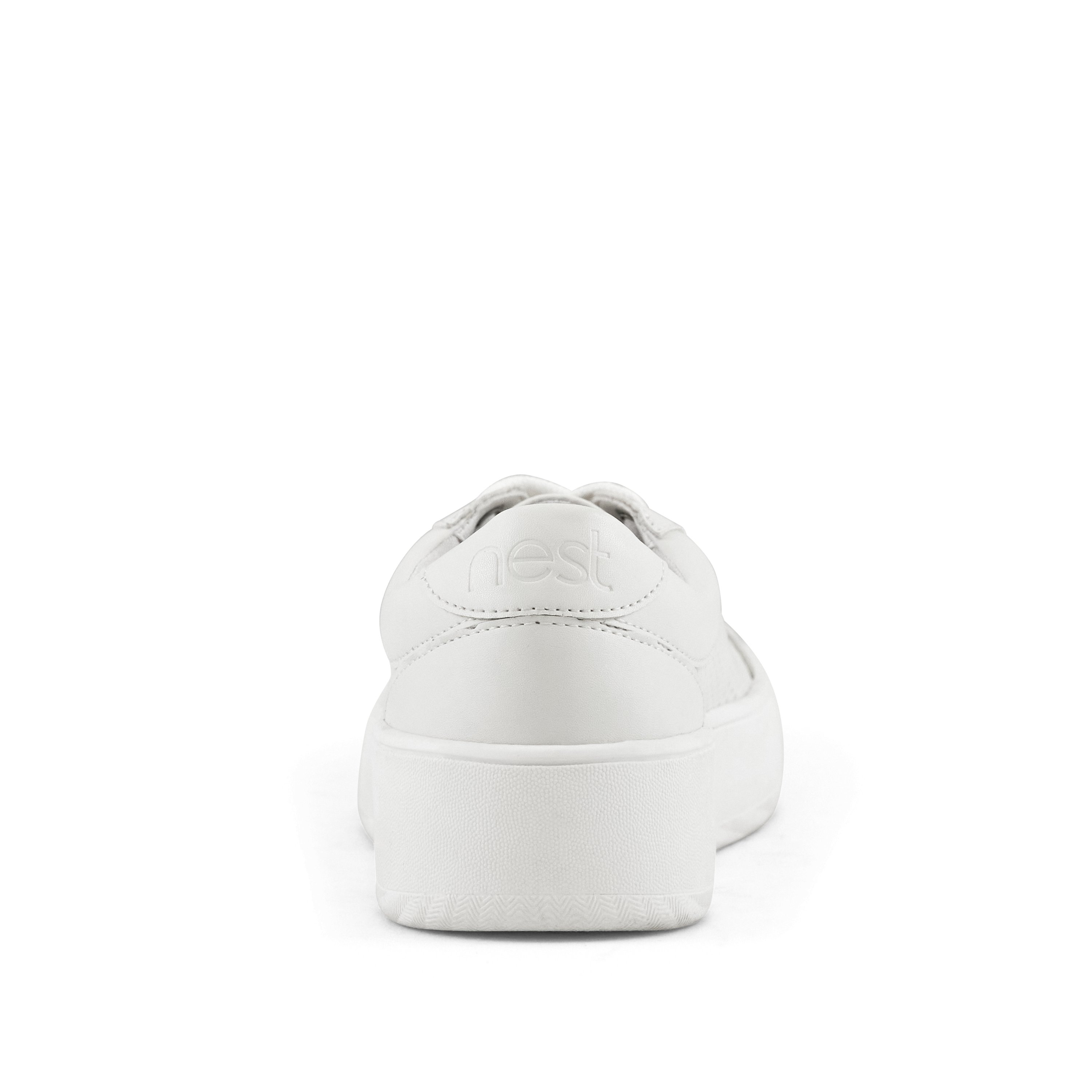 White sneaker, rear view.
