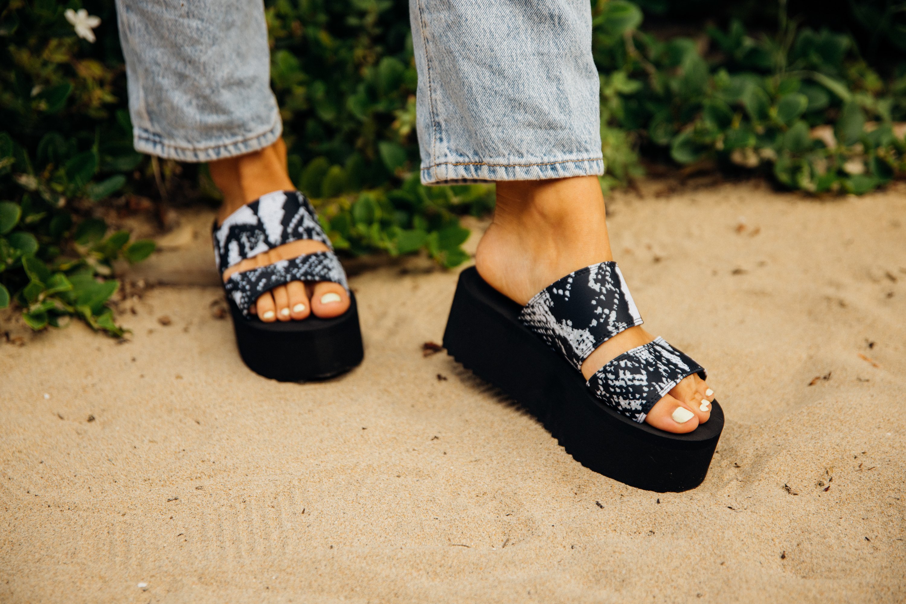 Women's Platform Sandal featuring a black snake print with dual straps and a chunky 2.5" platform sole.