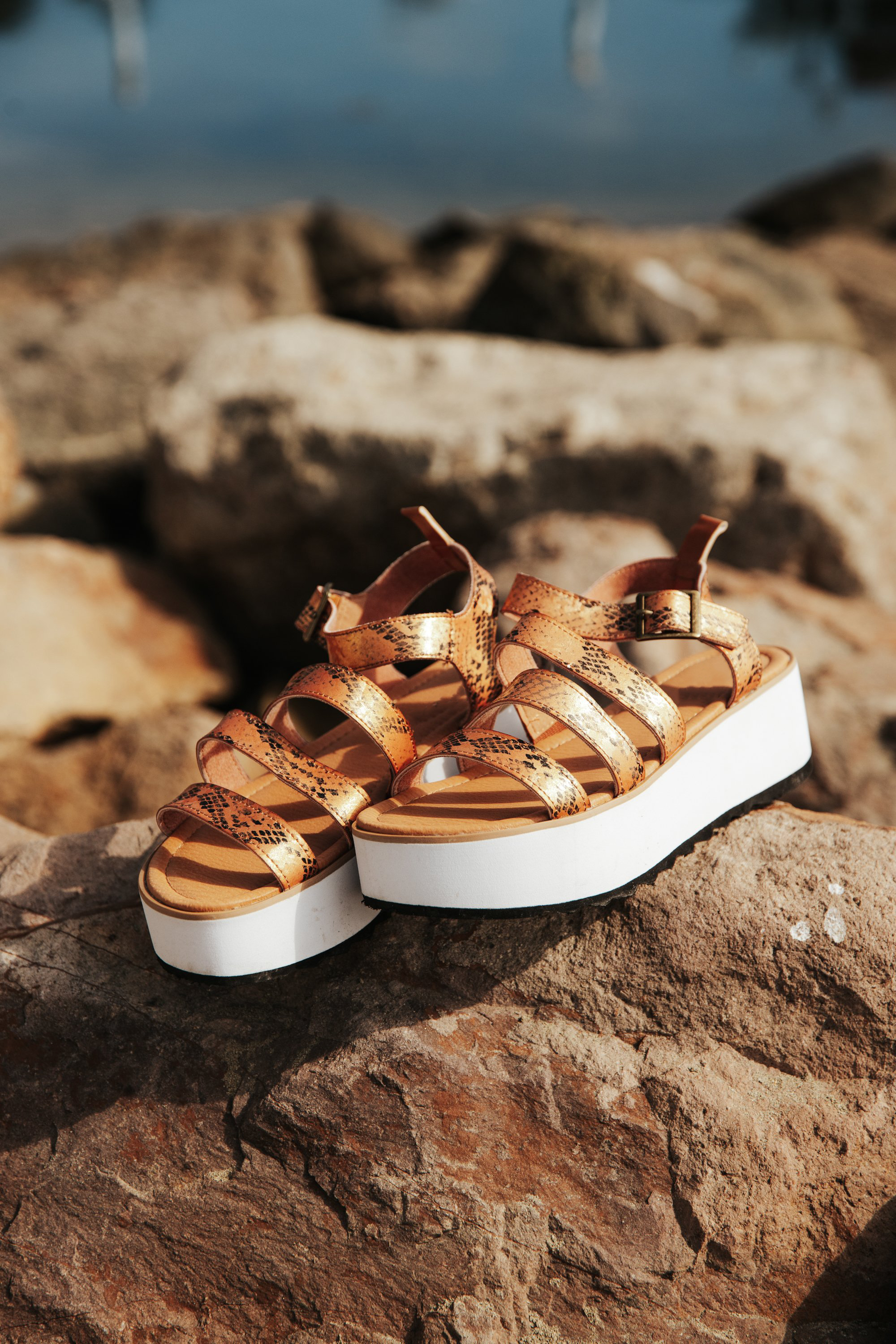 Women's Platform Sandal Kauai in snake-tan pattern with three stylish straps and adjustable ankle closure.