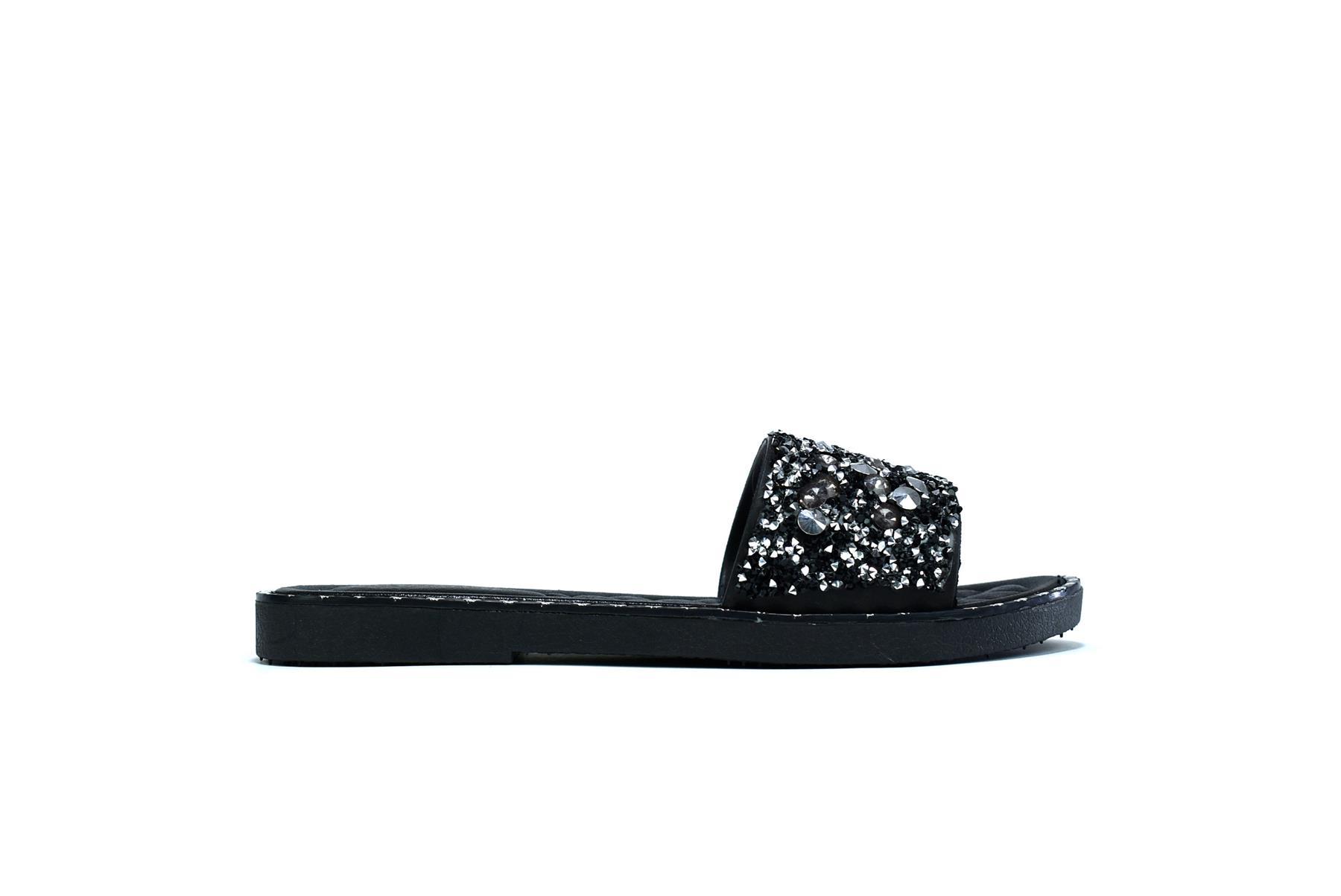 Women's black glitter sliders with a single platform design, made from synthetic PVC material, showcasing a stylish and comfortable look.