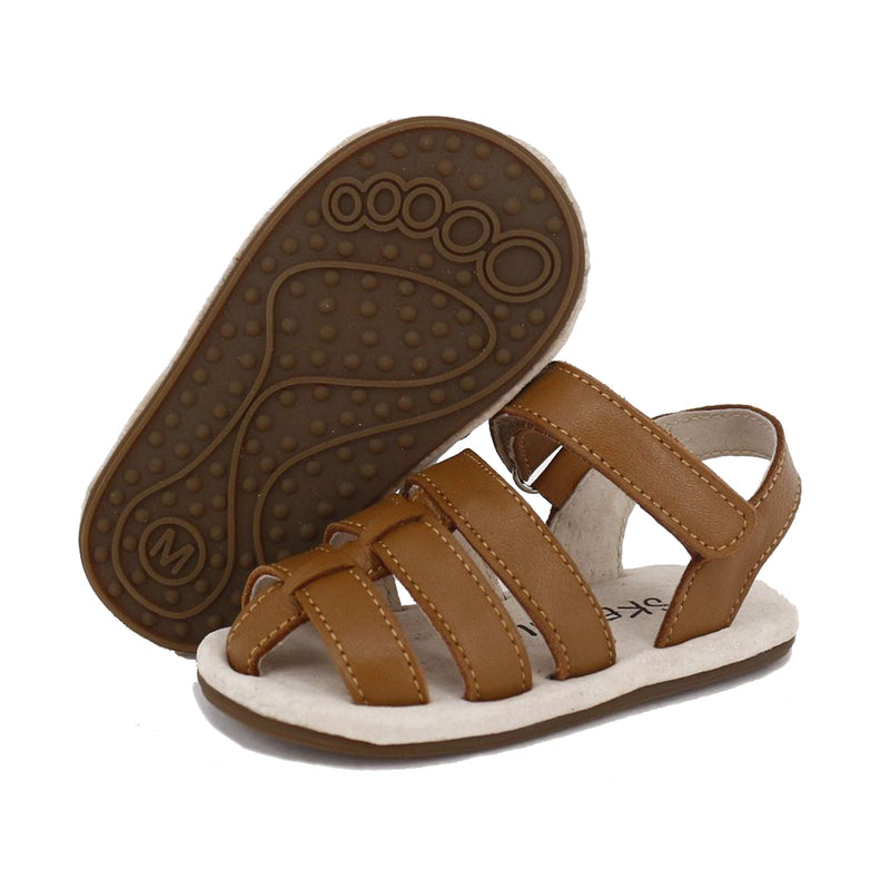 SKEANIE Ziggie First Walker Sandals in Tan, featuring soft leather upper and flexible rubber sole, designed for toddlers.