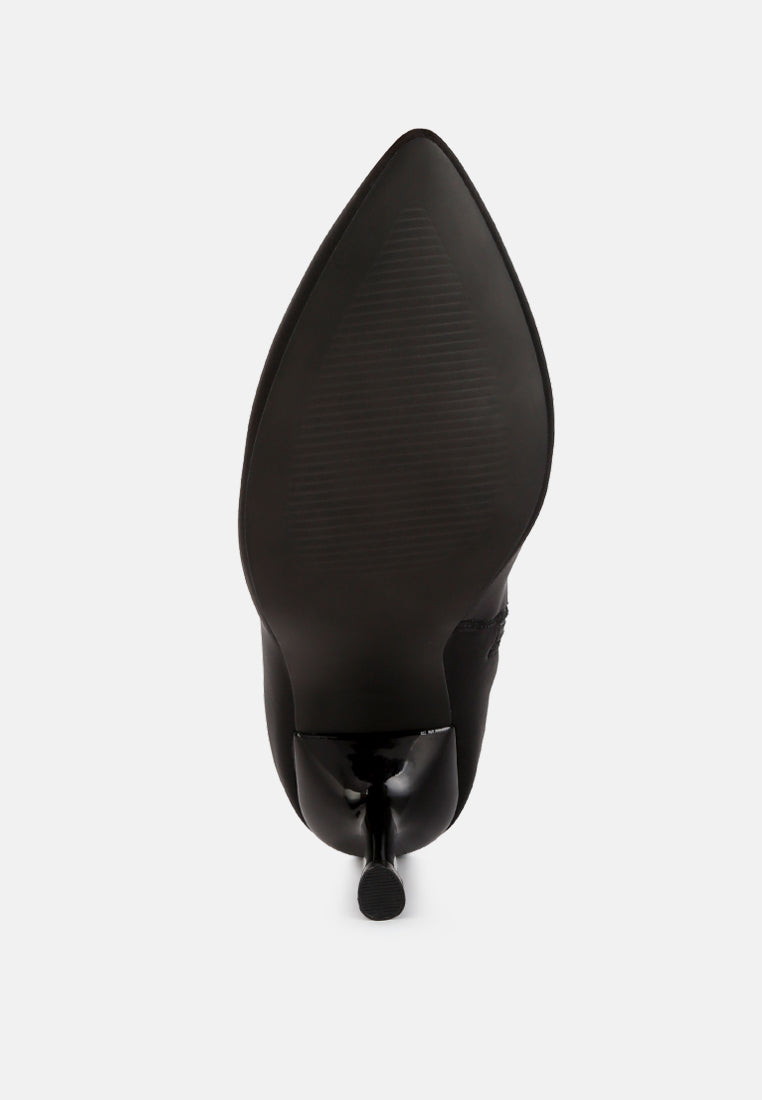 Zudio Solid Mid Heel Sock Boots featuring a lycra upper, low stiletto heel, and slip-on design, perfect for stylish comfort.