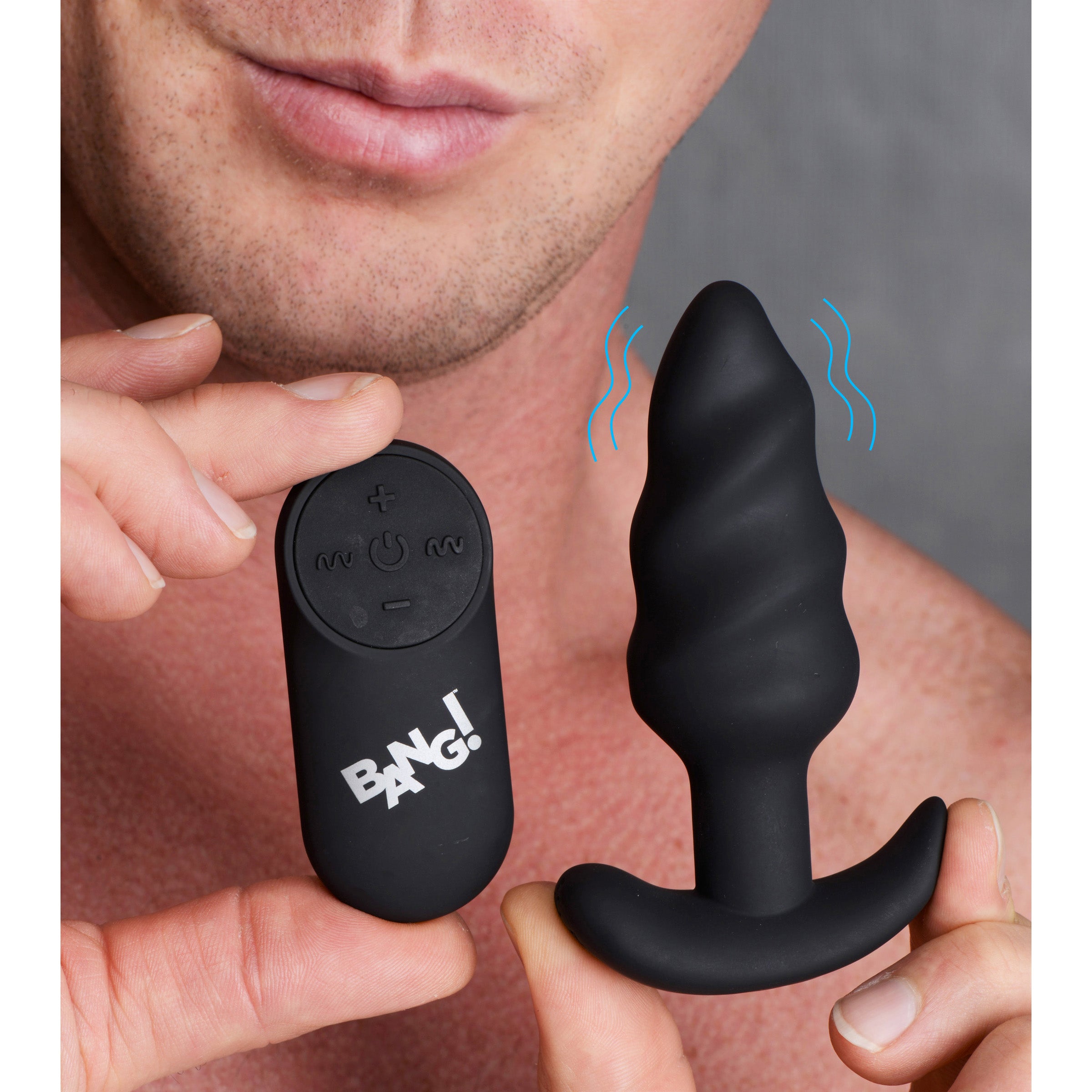 21X Remote Control Vibrating Silicone Swirl Butt Plug in black, showcasing its unique swirling design and premium silicone material.