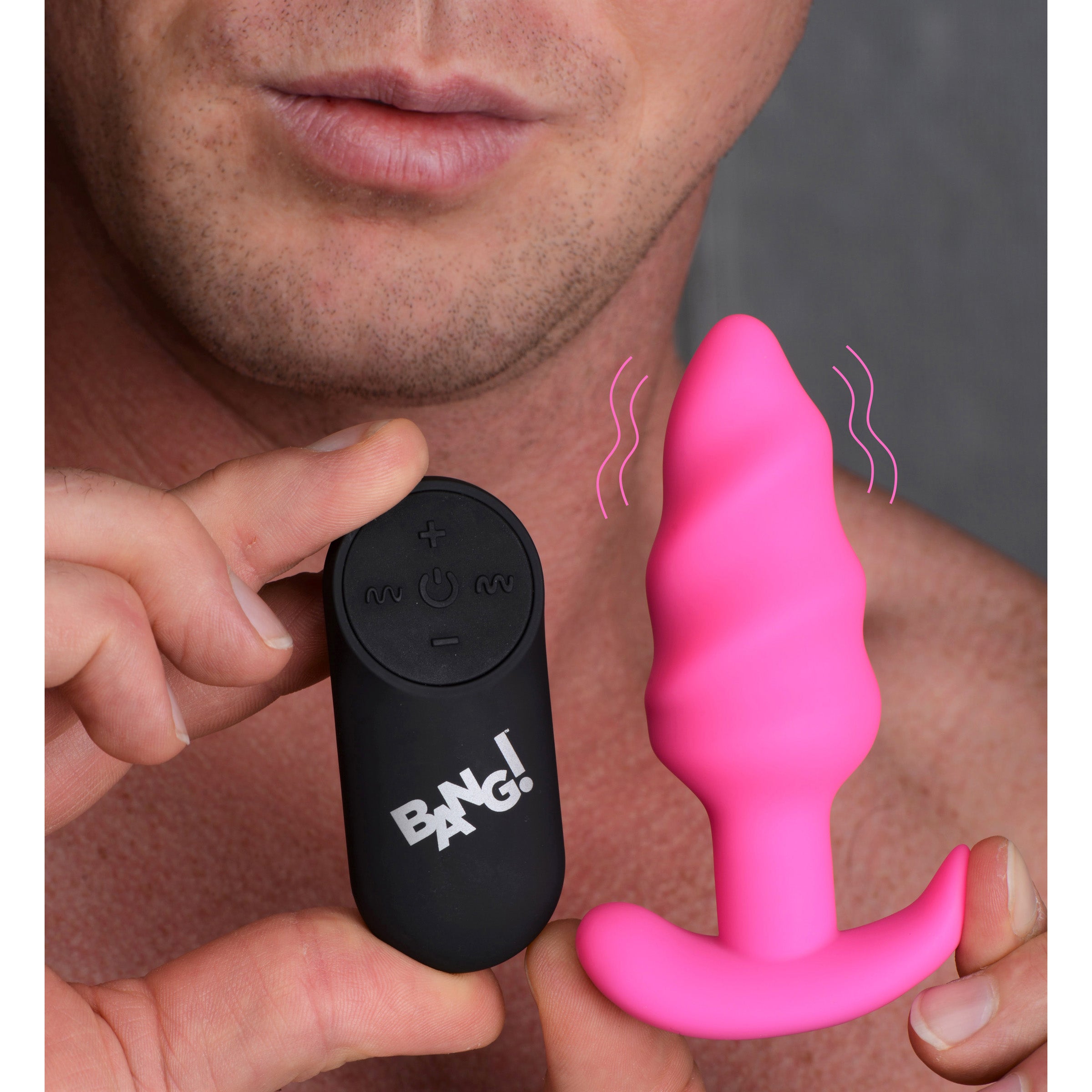 21X Remote Control Vibrating Silicone Swirl Butt Plug in pink, showcasing its unique swirling design and premium silicone material.