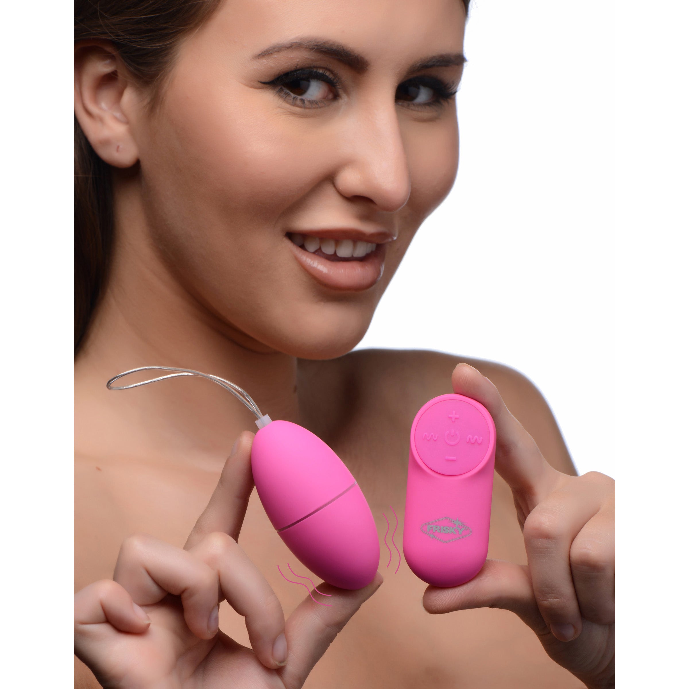 28X Scrambler Vibrating Egg in Pink with remote control, showcasing its sleek design and features.