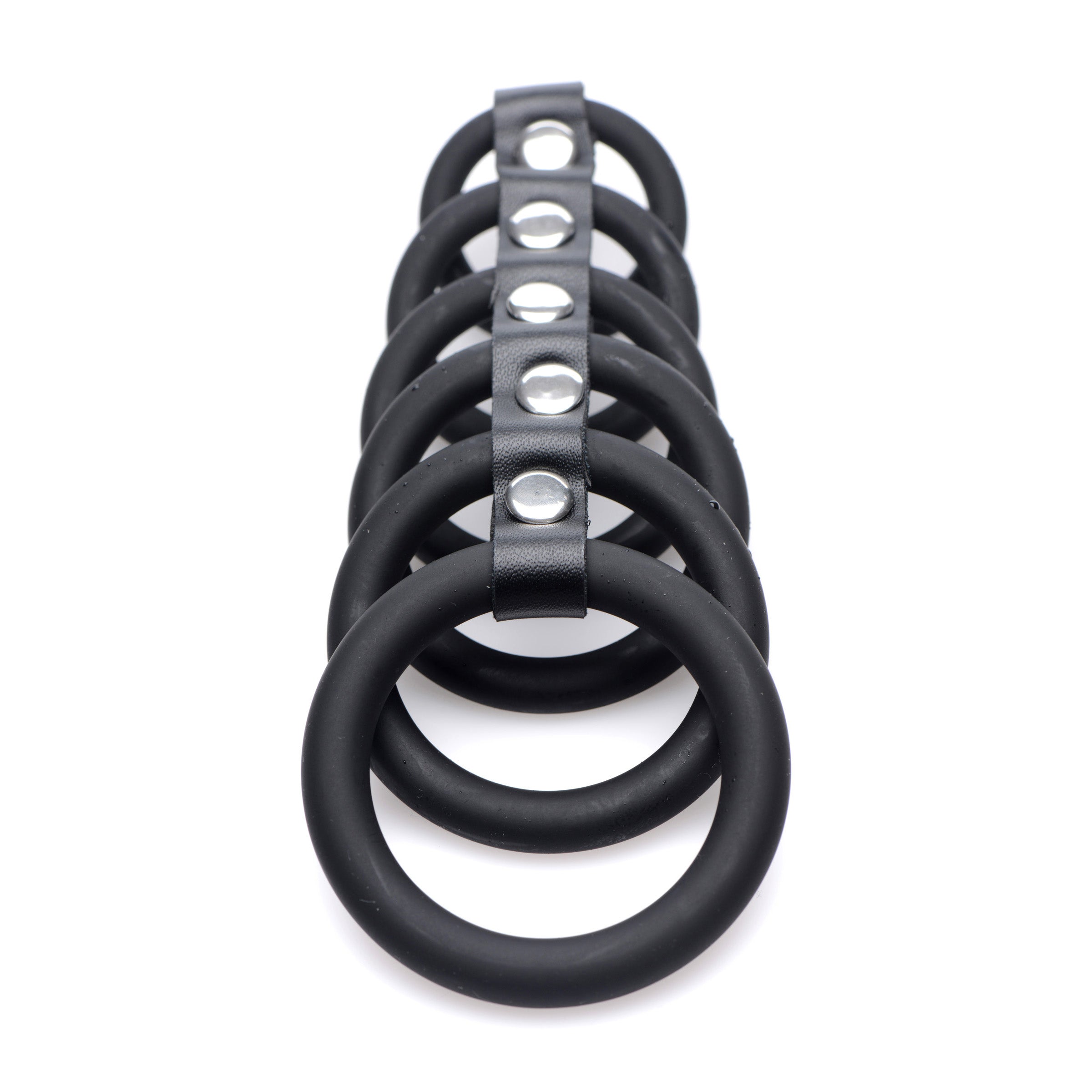 A black 6 Ring Silicone Chastity Device designed for BDSM and chastity play, featuring six snug rings for secure fit and comfort.