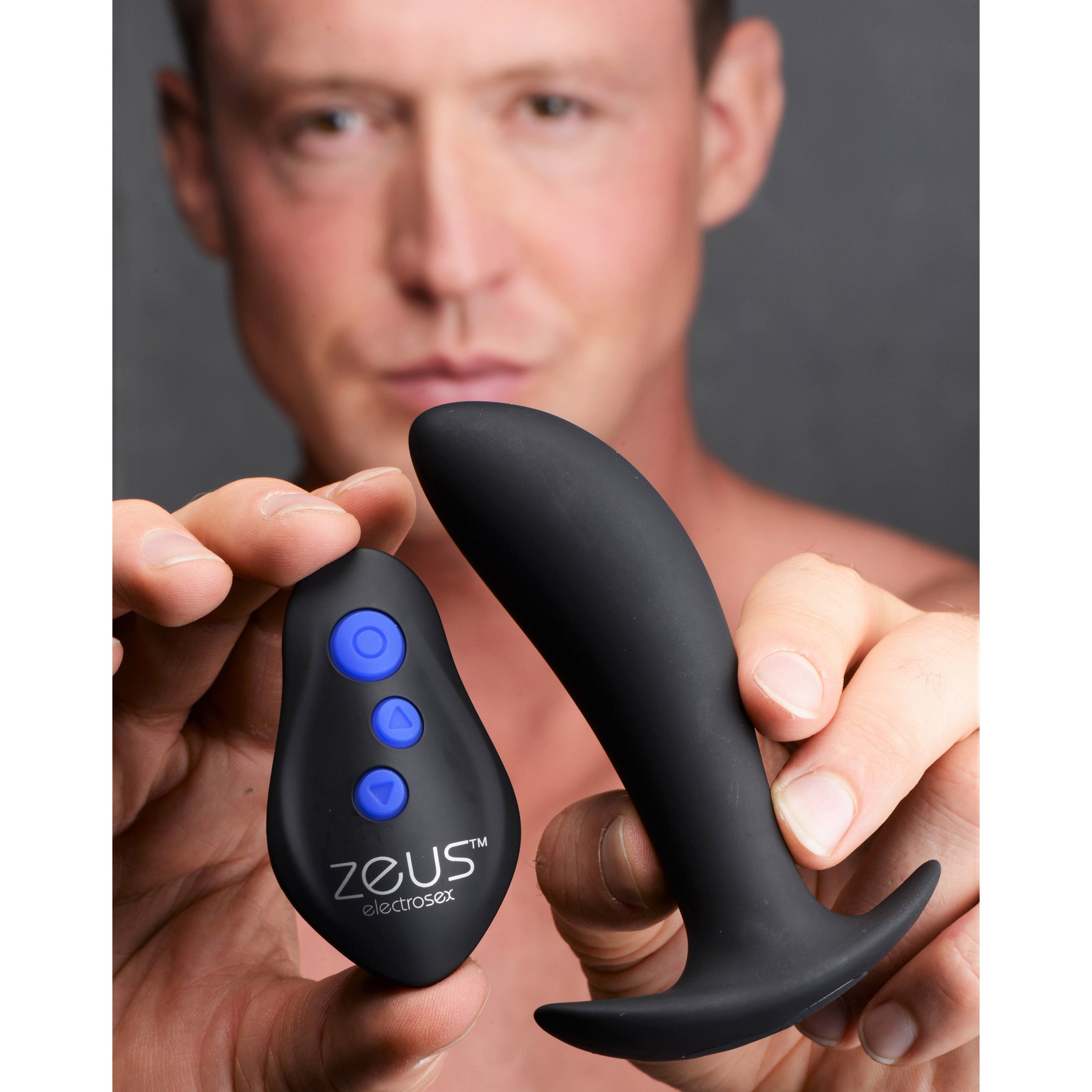 64X Pro-Shocker Vibrating and E-stim Prostate Plug in sleek black silicone, designed for intense prostate stimulation and electro play.
