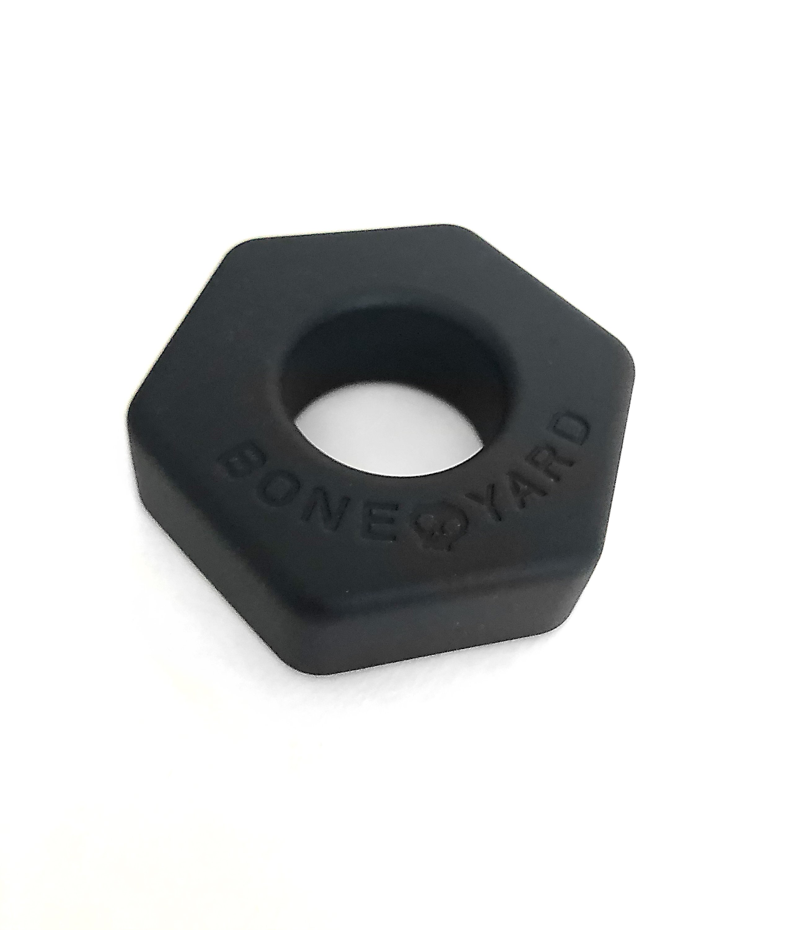Boneyard Bust A Nut Black cock/ball ring made of soft touch silicone, showcasing its sleek design and durable stretch.