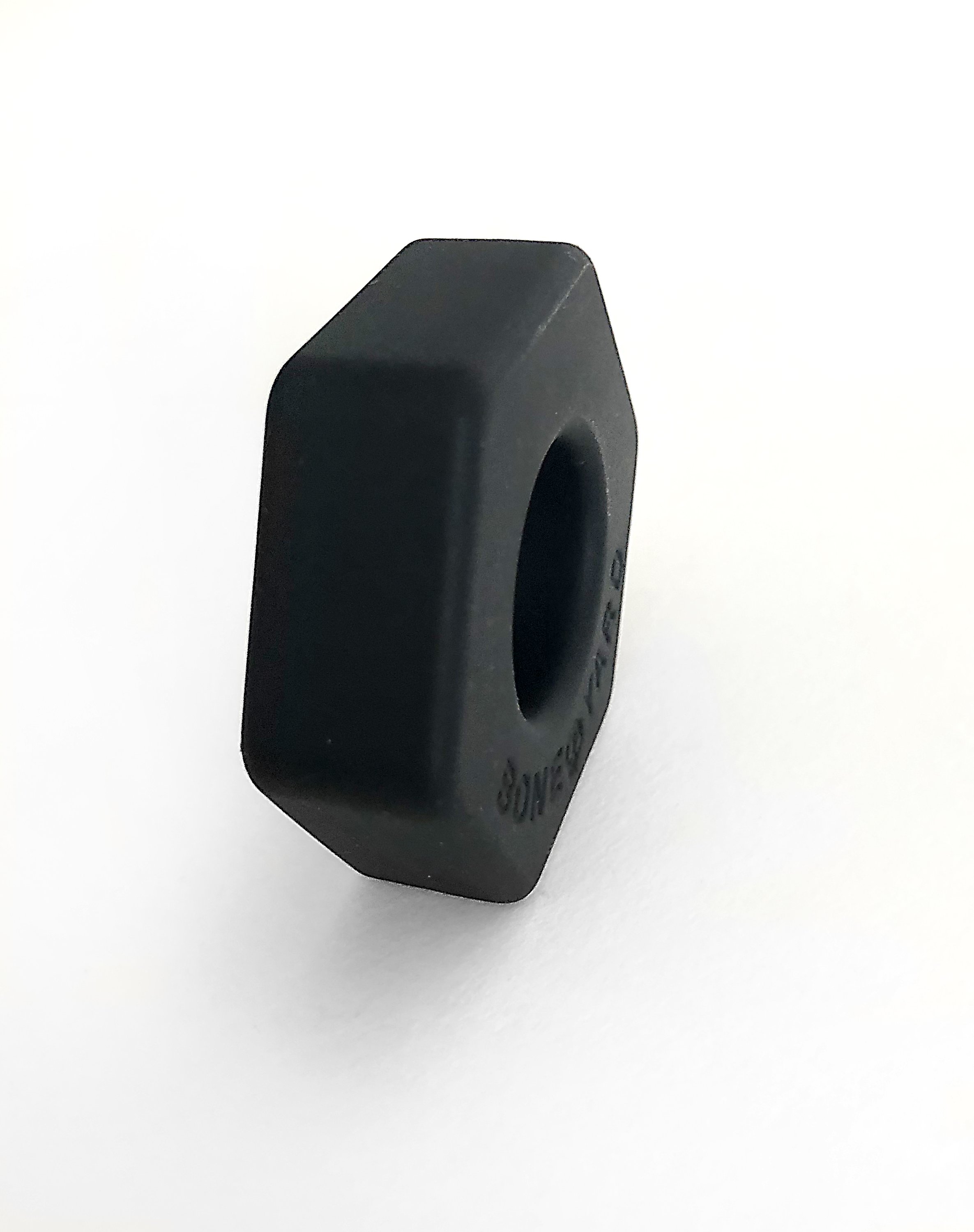 Boneyard Bust A Nut Black cock/ball ring made of soft touch silicone, showcasing its sleek design and durable stretch.