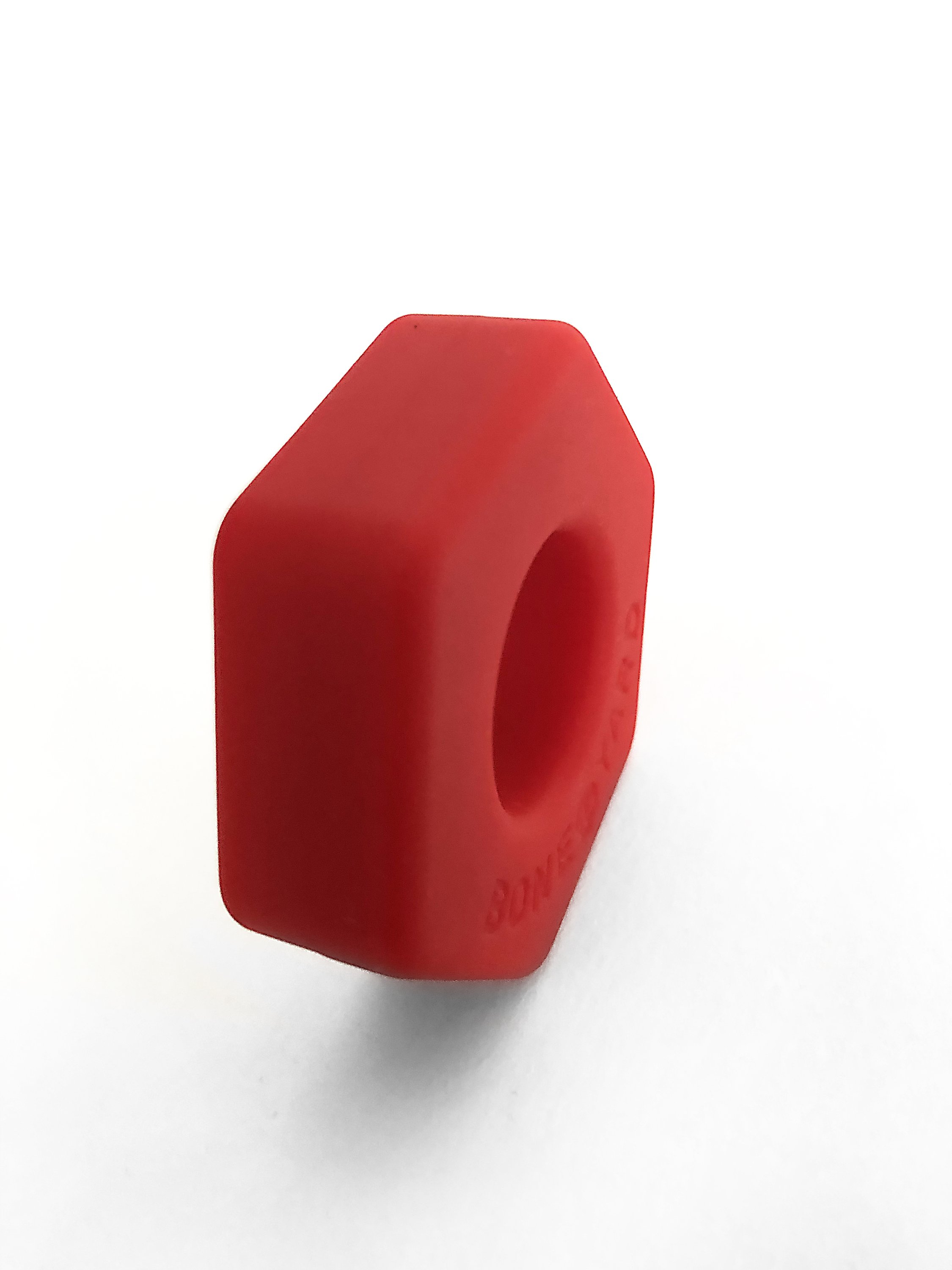 Boneyard Bust a Nut Red cock/ball ring made of soft touch silicone, featuring a sleek design and durable stretch for enhanced comfort and performance.