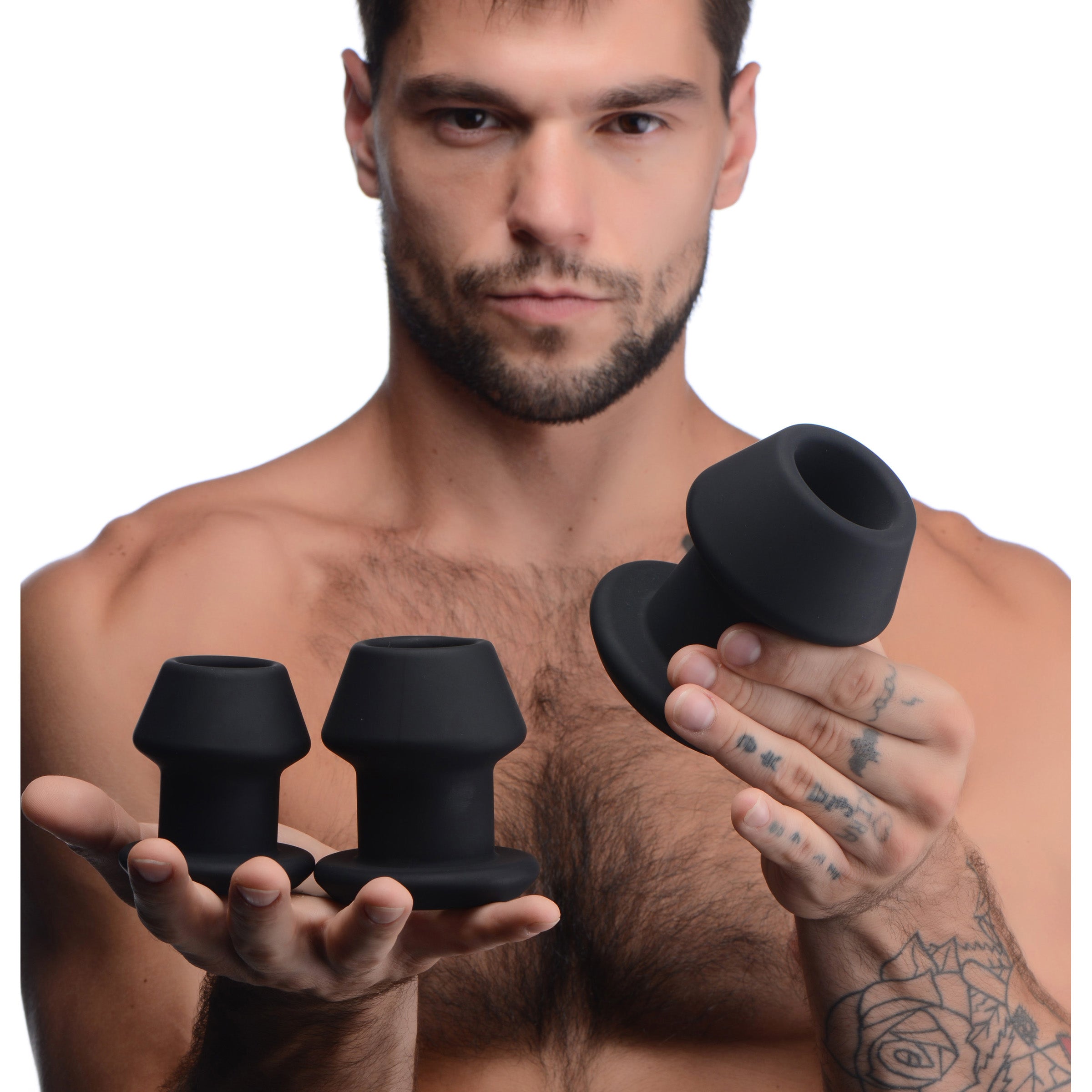 Gape-Grommets 3 Piece Hollow Silicone Anal Dilator Set in black, showcasing three graduated sizes for anal stretching.