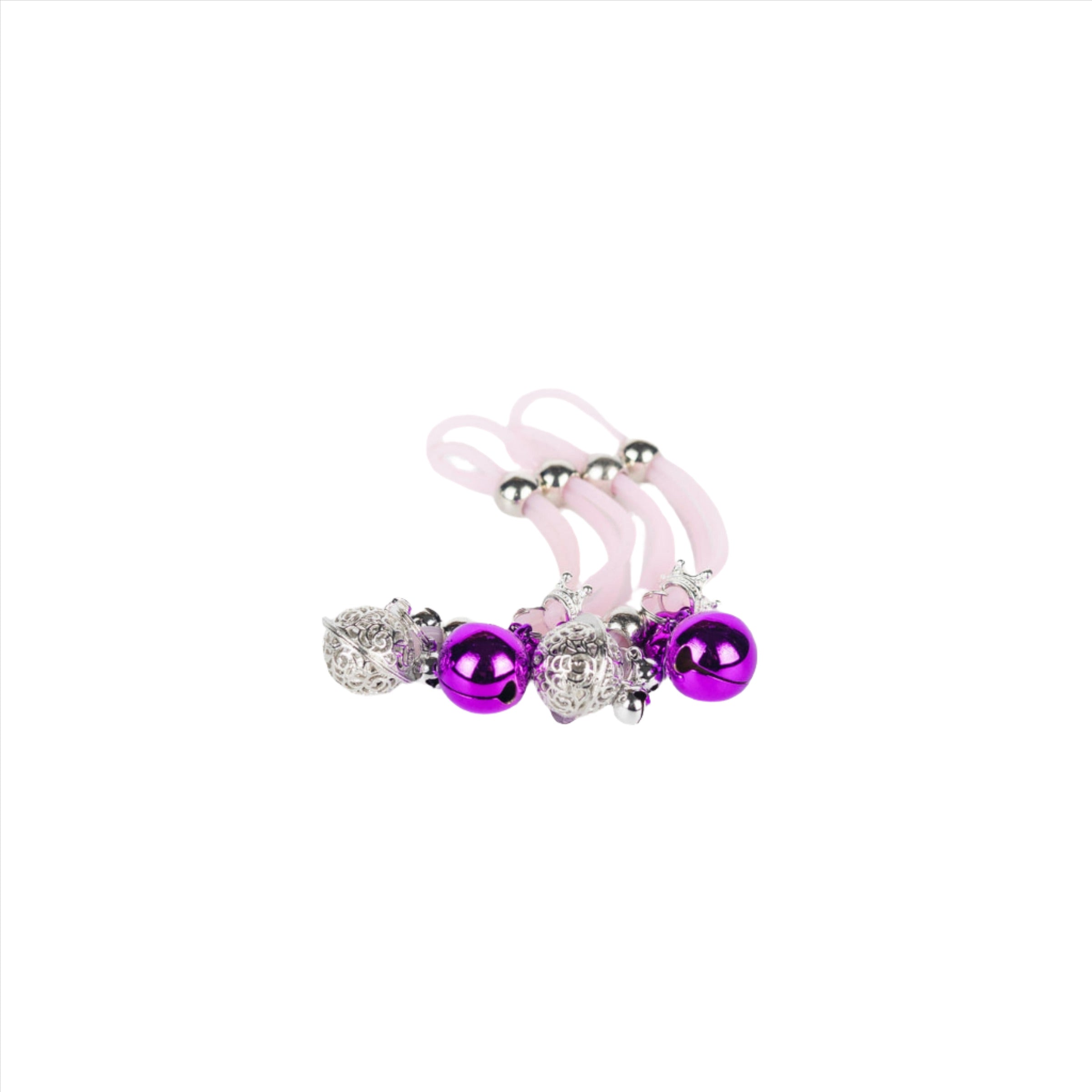 Go Glow Nipple Gems featuring silver and purple designs, adjustable for comfort, perfect for playful occasions.