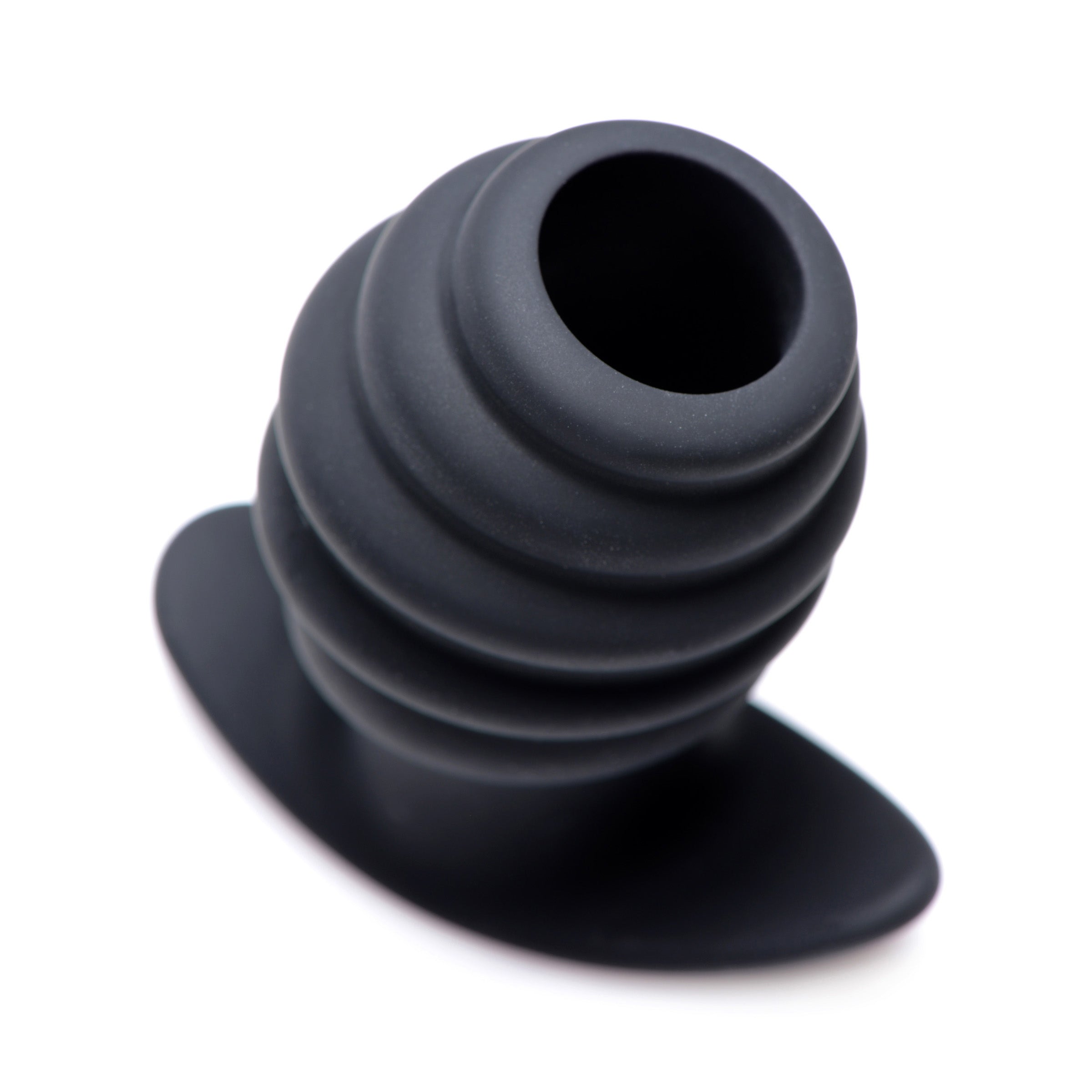 Hive Ass Tunnel Silicone Ribbed Hollow Anal Plug in black, showcasing its ribbed texture and hollow core design.