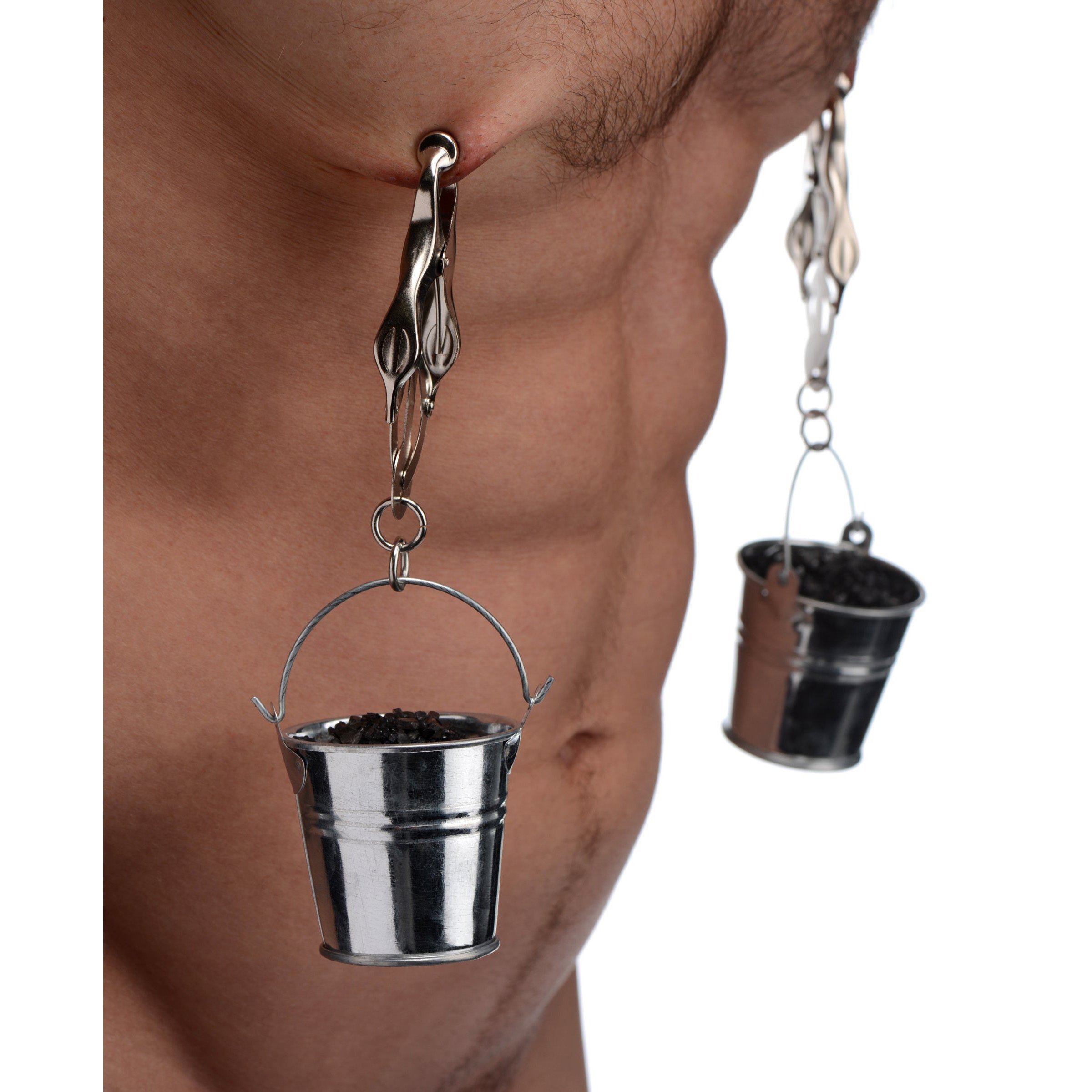 A pair of Jugs Nipple Clamps with small hanging buckets, designed for BDSM play, featuring rubber tips for comfort and stainless steel construction.