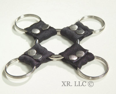 A heavy-duty lockable hogtie made of nylon and steel, featuring four attachment points for secure bondage.