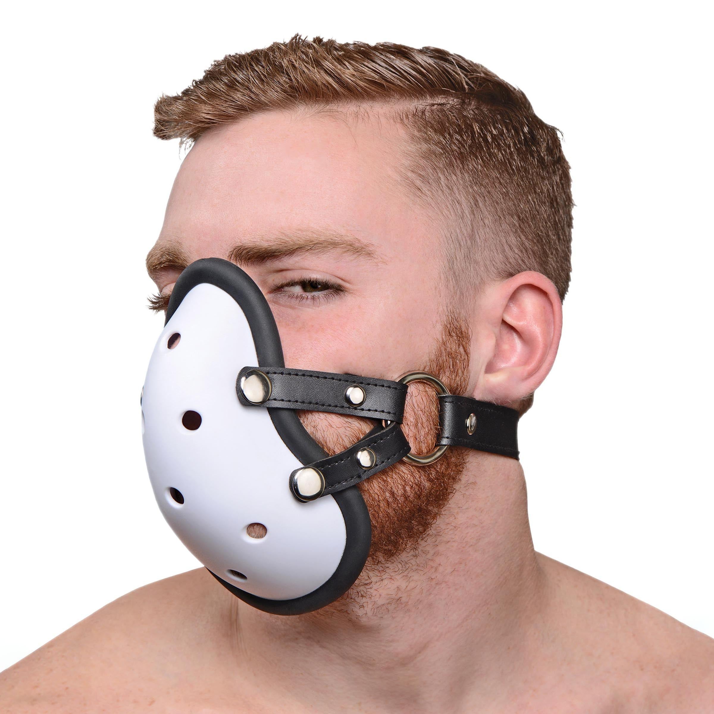 Musk Athletic Cup Muzzle featuring a silicone-lined athletic cup with adjustable straps, designed for sensory and humiliation play.