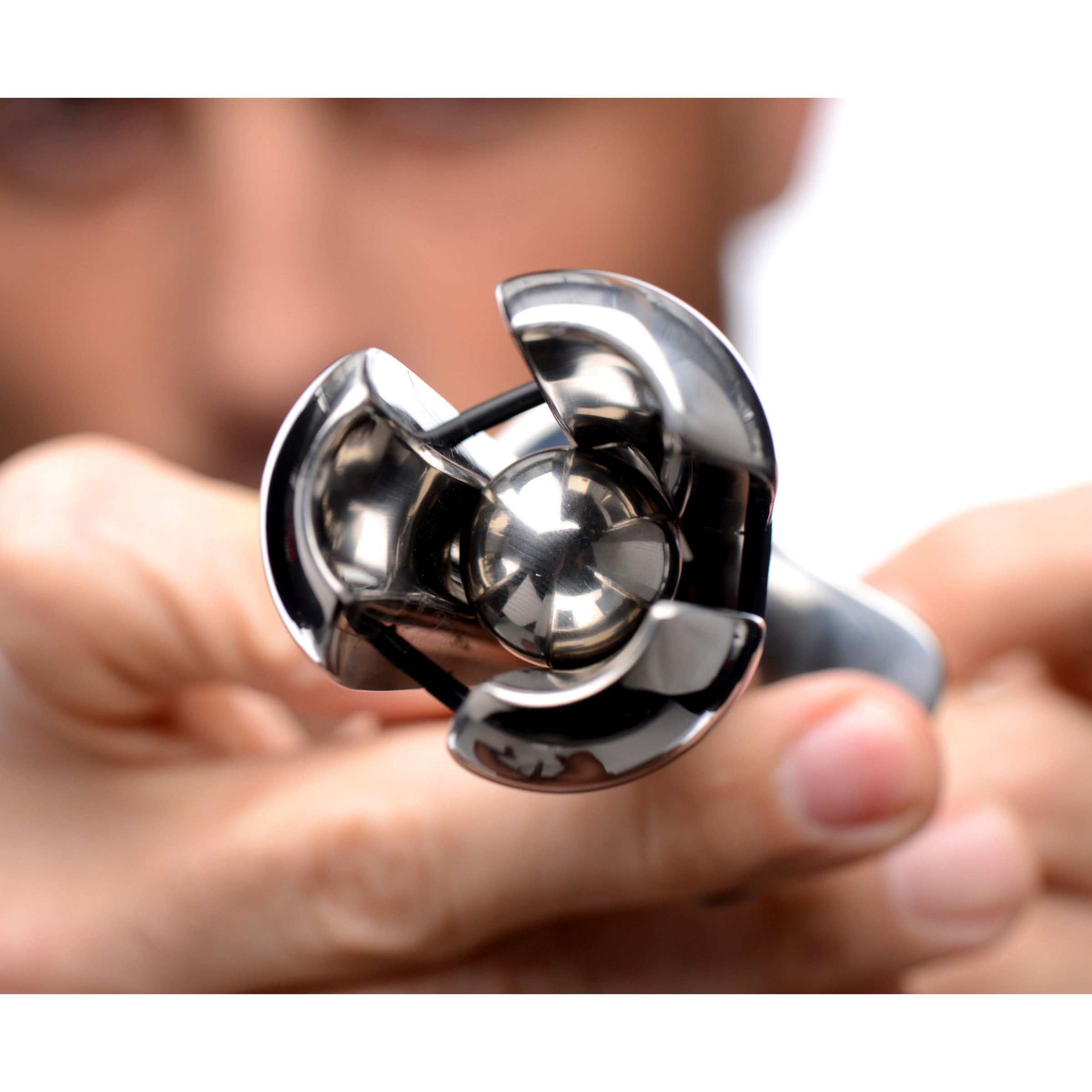 Petite Stainless Steel Ass Lock with locking mechanism and adjustable prongs for anal play.