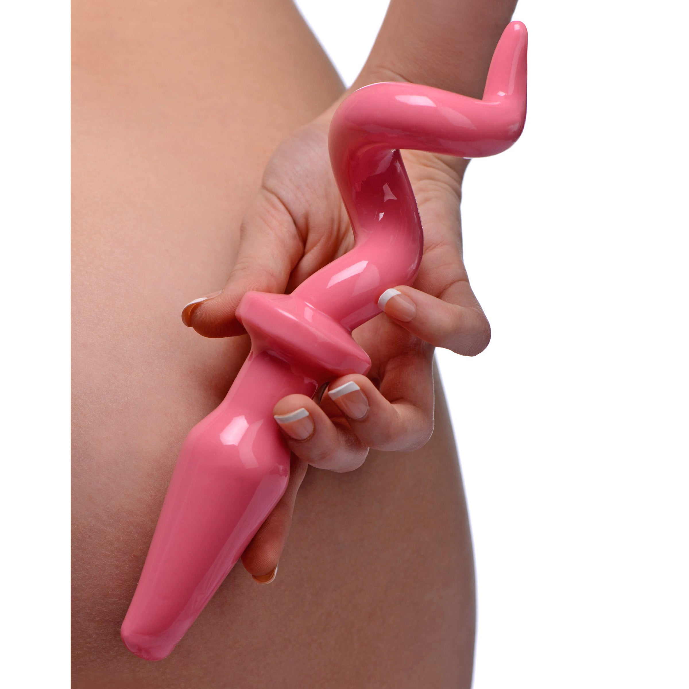 A vibrant bubblegum pink Piggy Tail Anal Plug with a curly tail, designed for playful and adventurous anal pleasure.