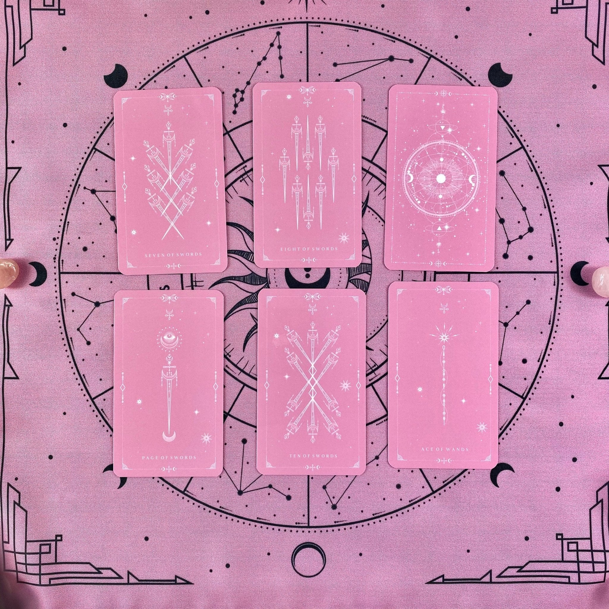 A luxurious pink tarot cloth measuring 18x18 inches, perfect for tarot card spreads, made from high-quality material.