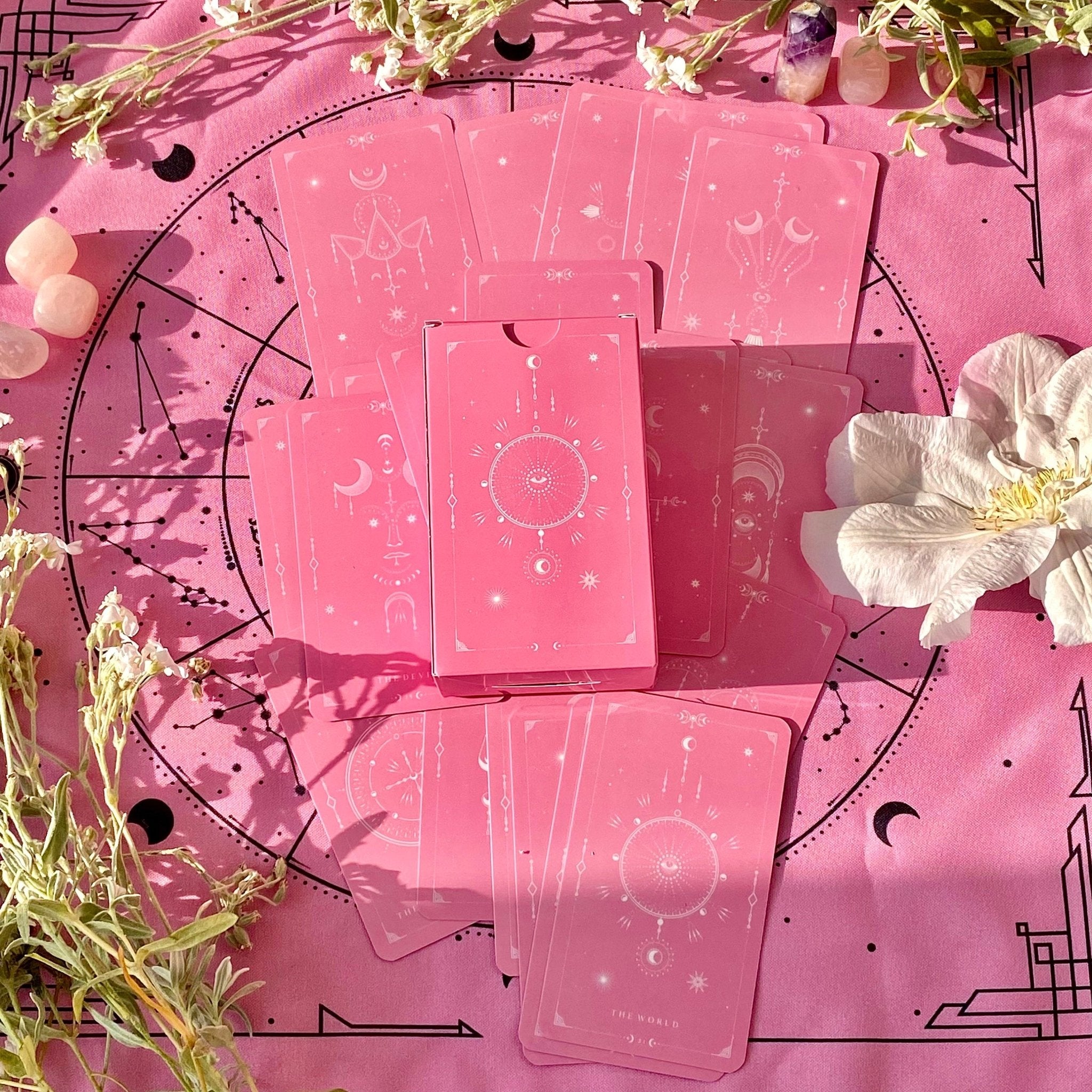 A luxurious pink tarot cloth measuring 18x18 inches, perfect for tarot card spreads, made from high-quality material.