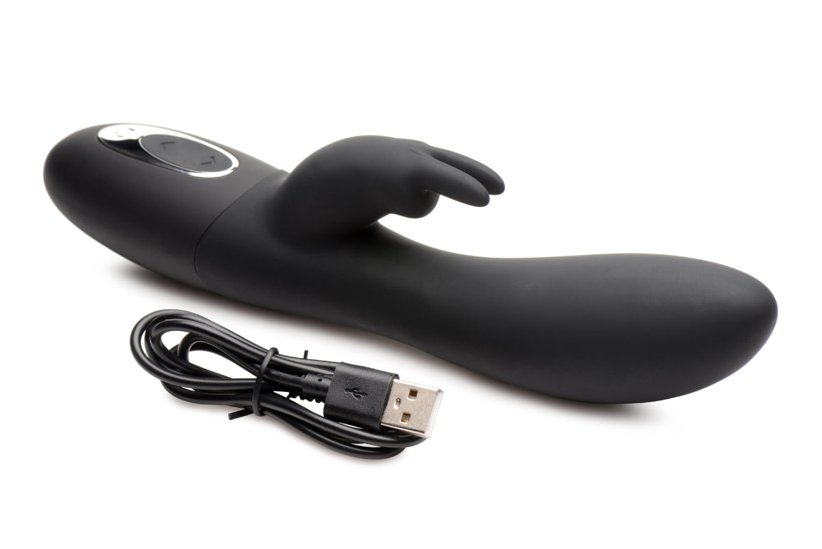 Power Bunnies Dizzy 72X Rotating Beads Twirling Vibe showcasing its sleek silicone design and rotating beads for enhanced stimulation.