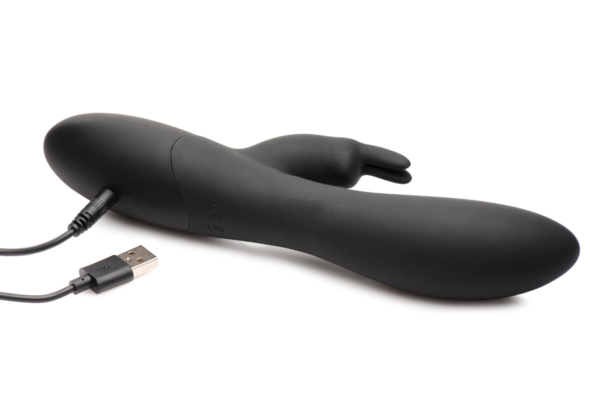 Power Bunnies Dizzy 72X Rotating Beads Twirling Vibe showcasing its sleek silicone design and rotating beads for enhanced stimulation.