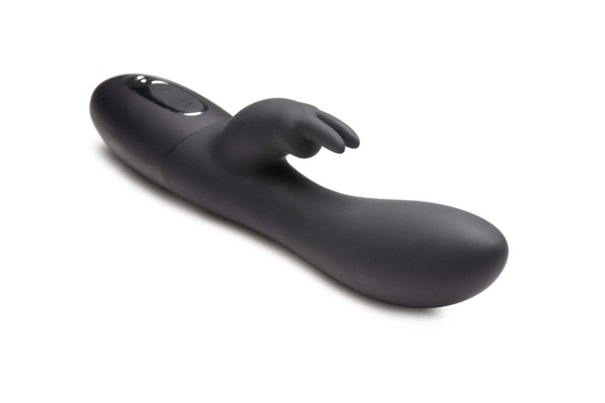 Power Bunnies Dizzy 72X Rotating Beads Twirling Vibe showcasing its sleek silicone design and rotating beads for enhanced stimulation.