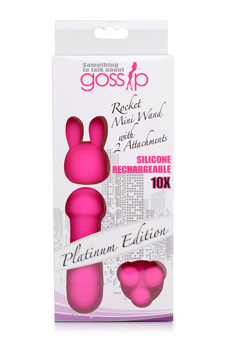 Rocket 10X Silicone Rechargeable Mini Wand in magenta with two attachments for enhanced pleasure.